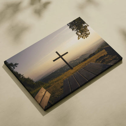 Nature landscape canvas wall art featuring a wooden cross at sunset over rolling hills.