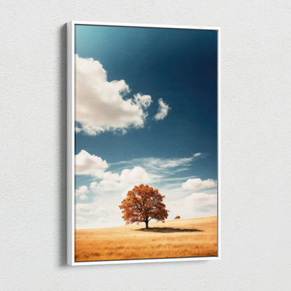 Canvas wall art featuring a solitary autumn tree in a golden field under a bright blue sky with scattered clouds.