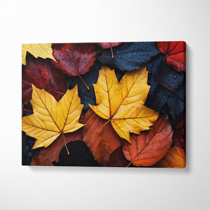 Canvas wall art featuring vibrant autumn leaves in red, orange, gold, and dark blue hues.