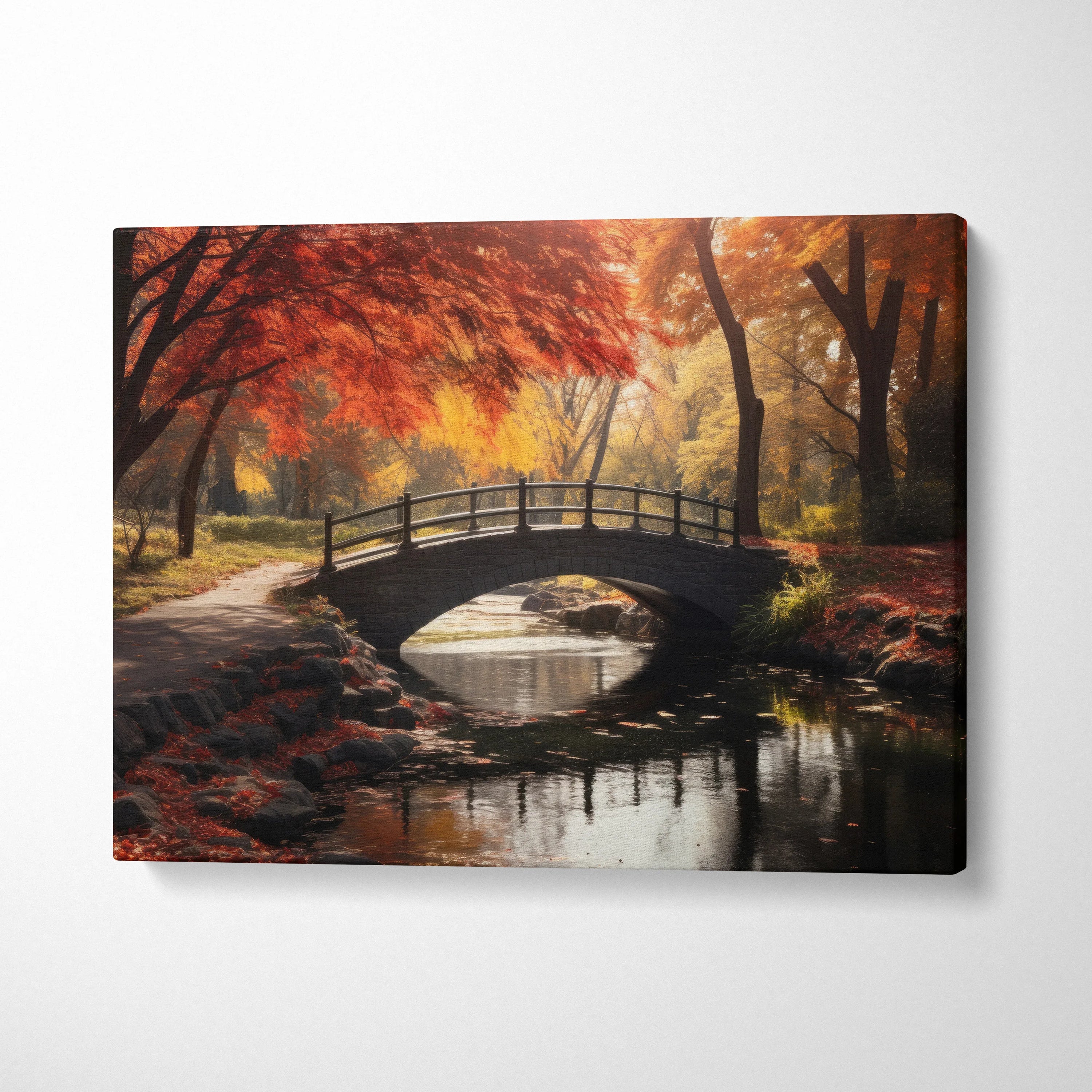 Autumn foliage canvas art with vibrant fall colors and stone bridge over reflective stream wall art.