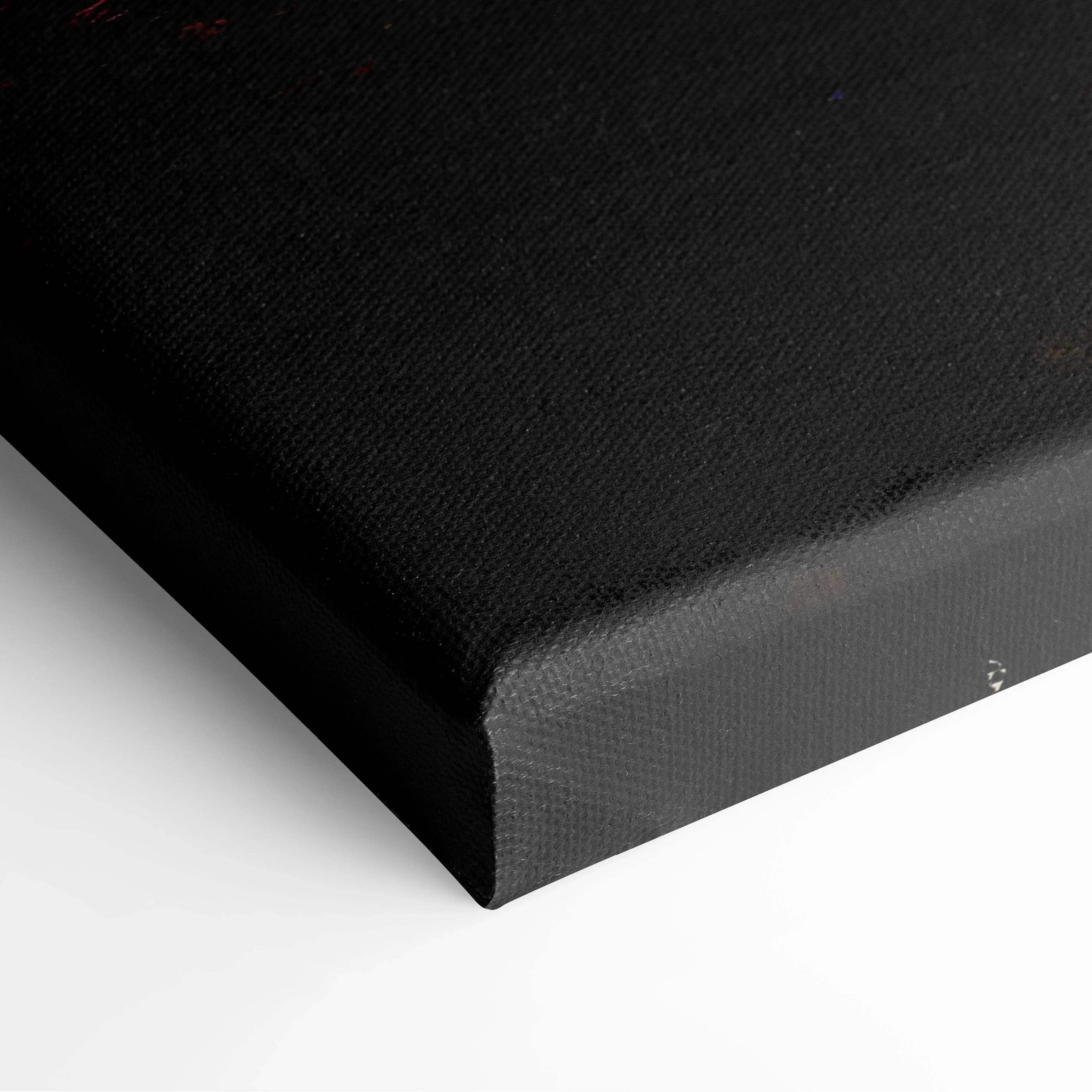Black stretched canvas wall art with a wrapped edge and subtle textured surface.