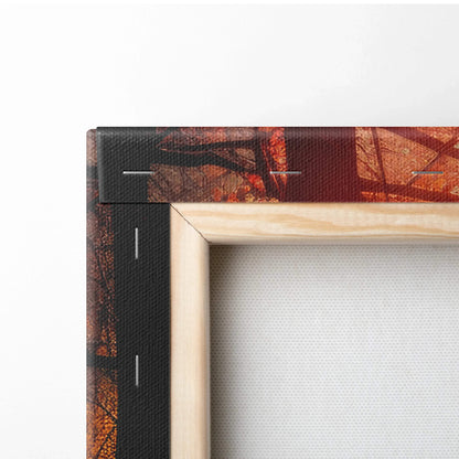 Close-up of wooden frame and stapled edge on autumn-themed canvas wall art print.