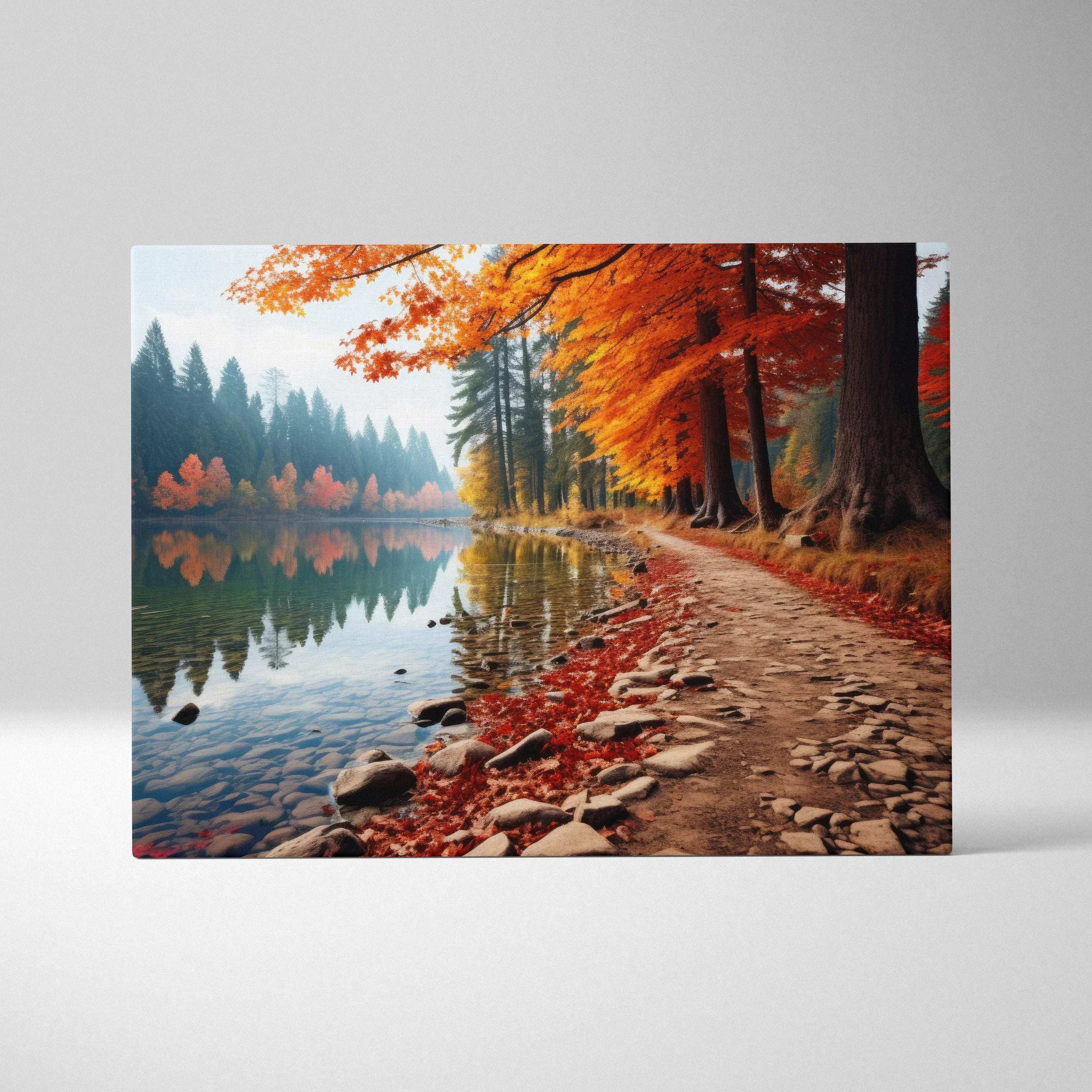 Autumn nature canvas wall art featuring vibrant red, orange, and gold leaves by a lake pathway.