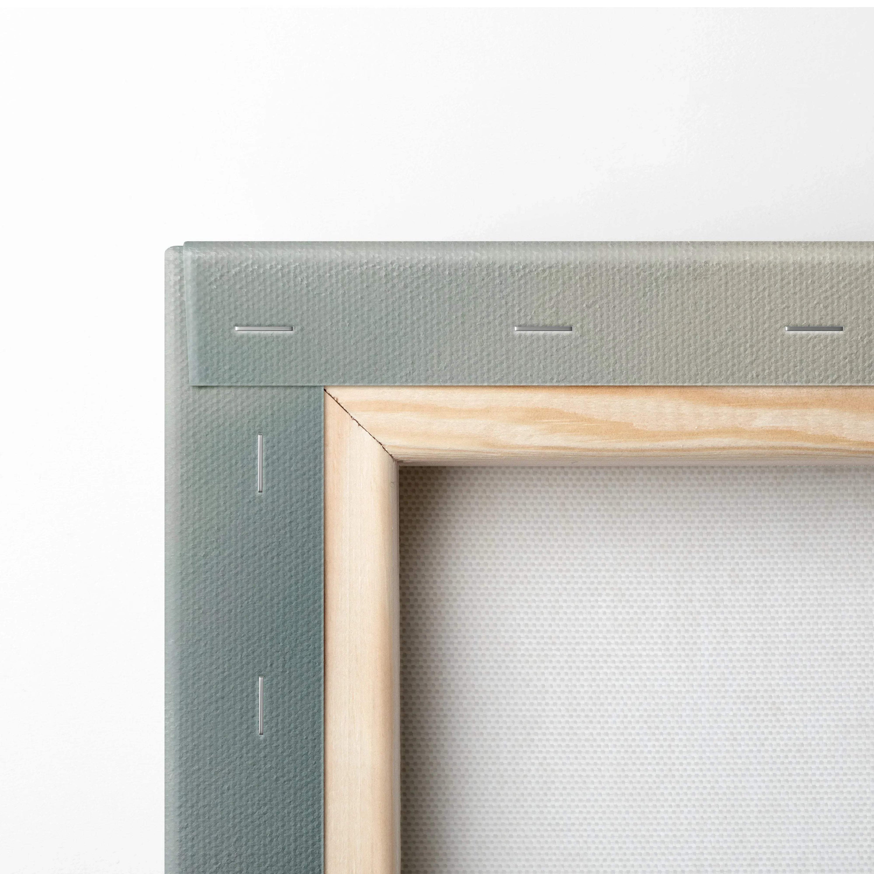 Close-up of wooden stretcher bars and gray canvas back of wall art canvas print.