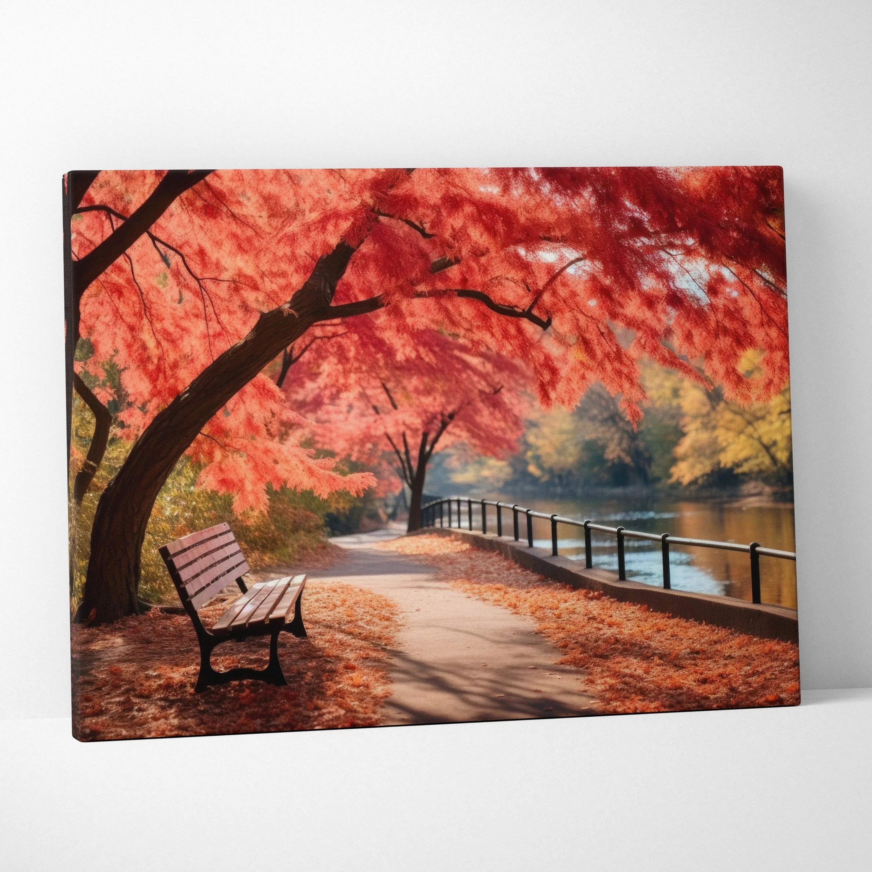 Autumn nature digital art canvas featuring vibrant red leaves, a bench, and golden riverside path wall art.