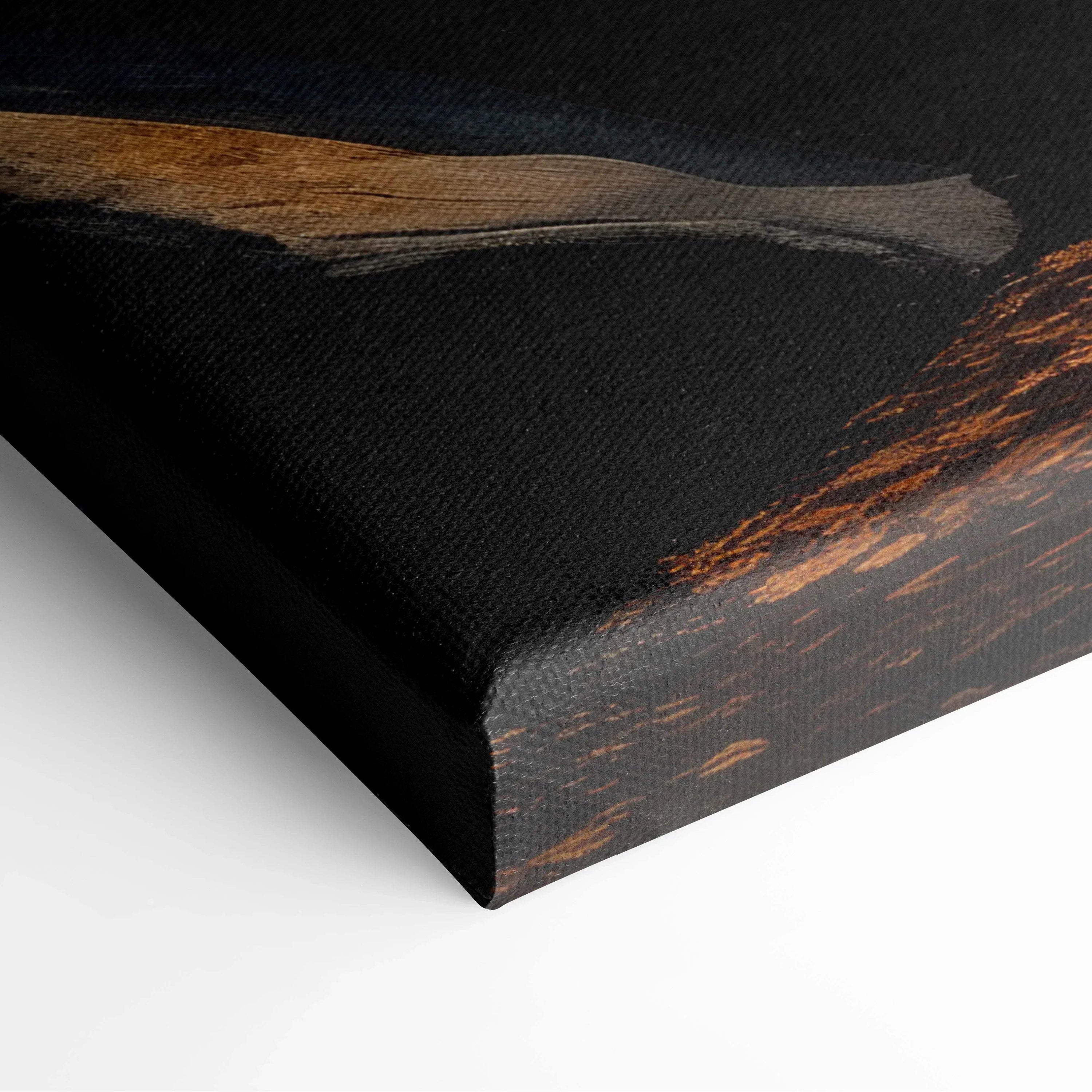 Close-up of black canvas art with vibrant orange and brown autumn leaf details on textured wall art.
