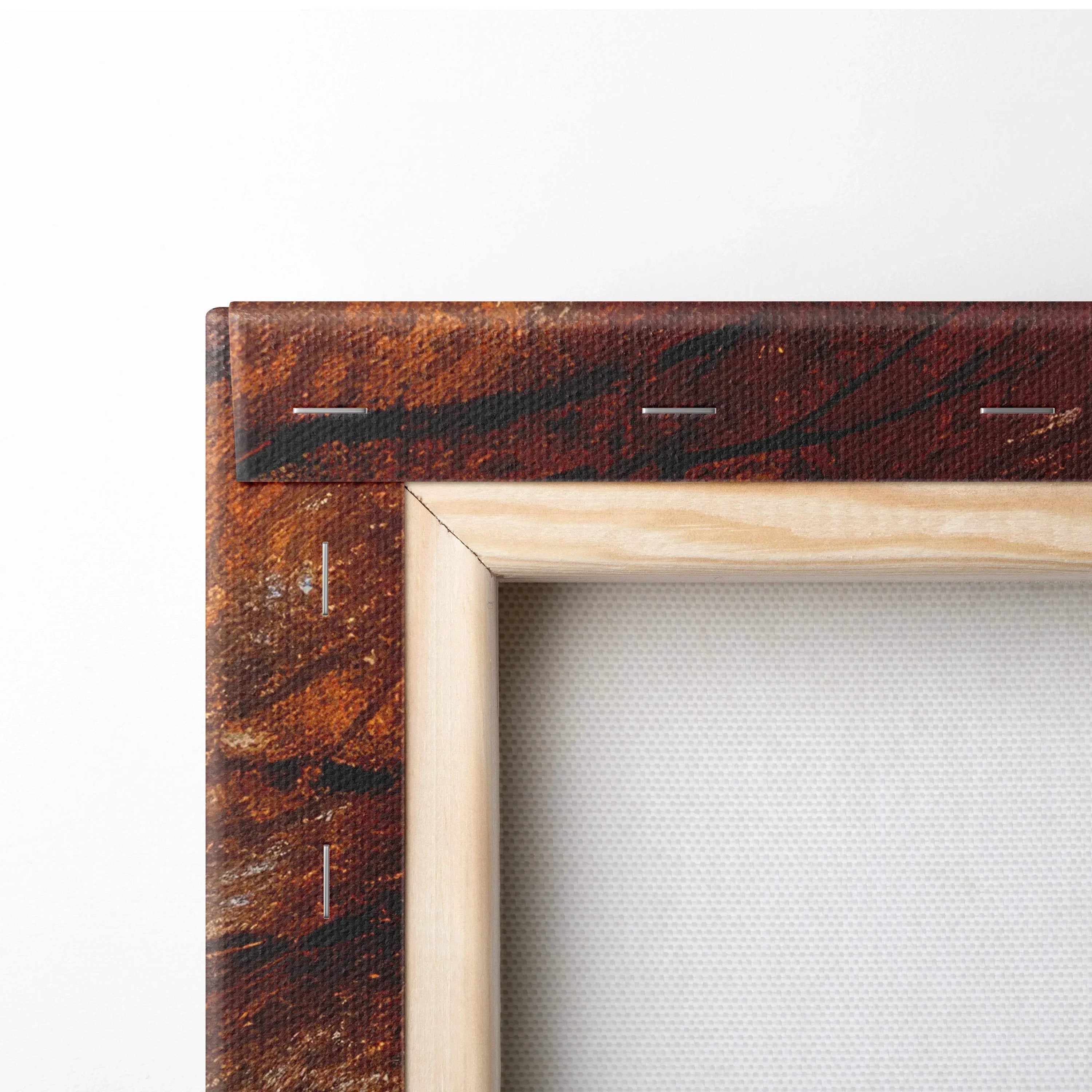 Close-up of wooden frame corner and stretched white canvas for art wall decor.