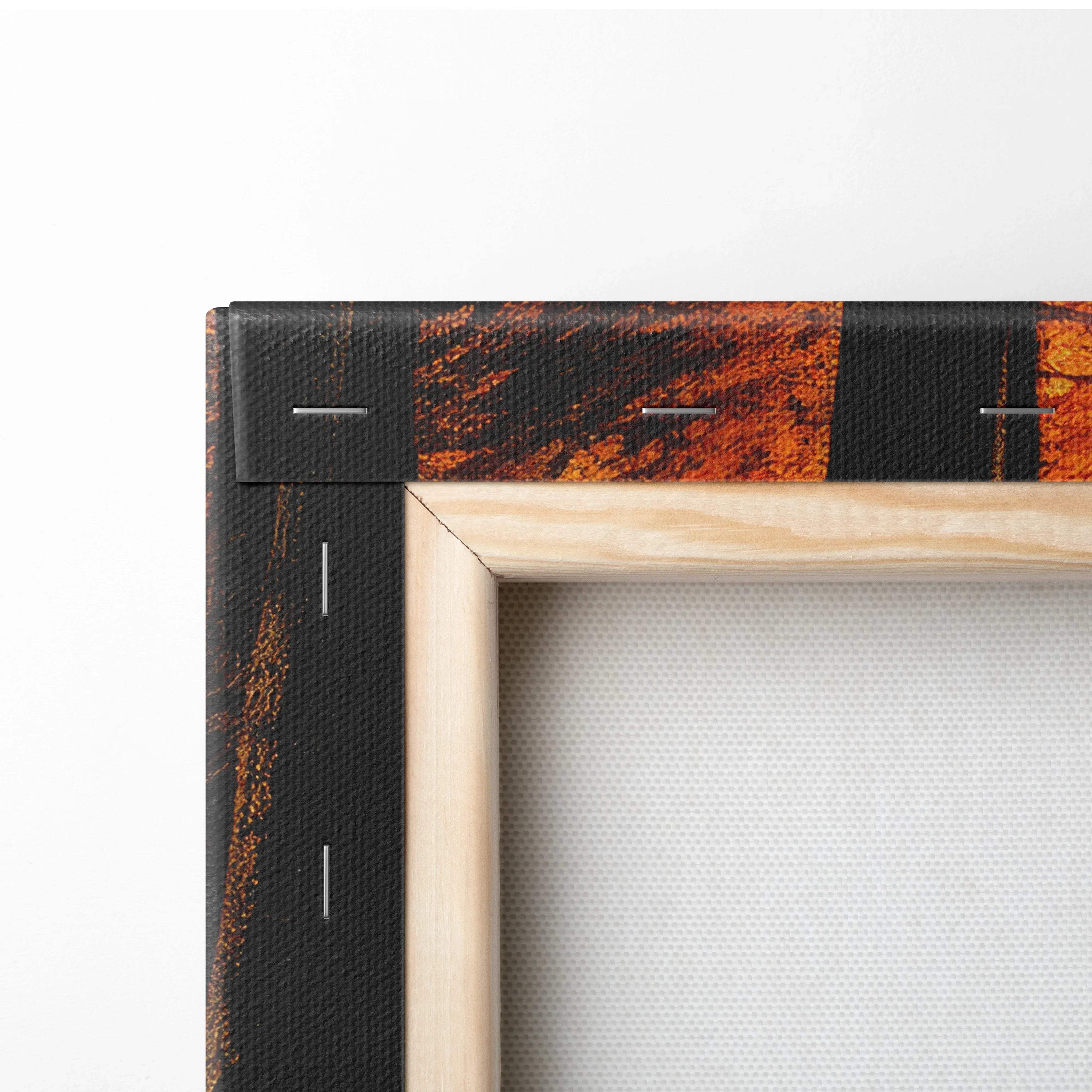 Close-up of wooden frame corner with vibrant autumn foliage printed on stretched canvas wall art.