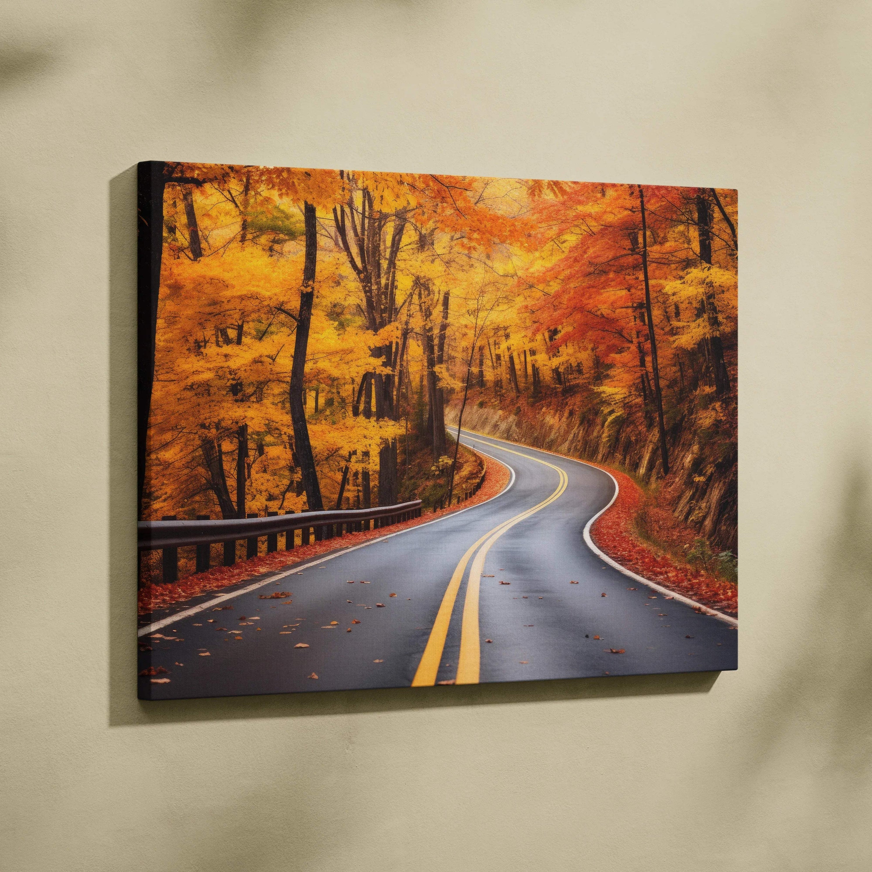 Vibrant autumn winding road with golden leaves canvas wall art in warm orange tones.