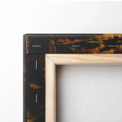 Close-up of wooden frame corner with vibrant autumn digital art canvas print, showcasing rich fall foliage and scenic road.