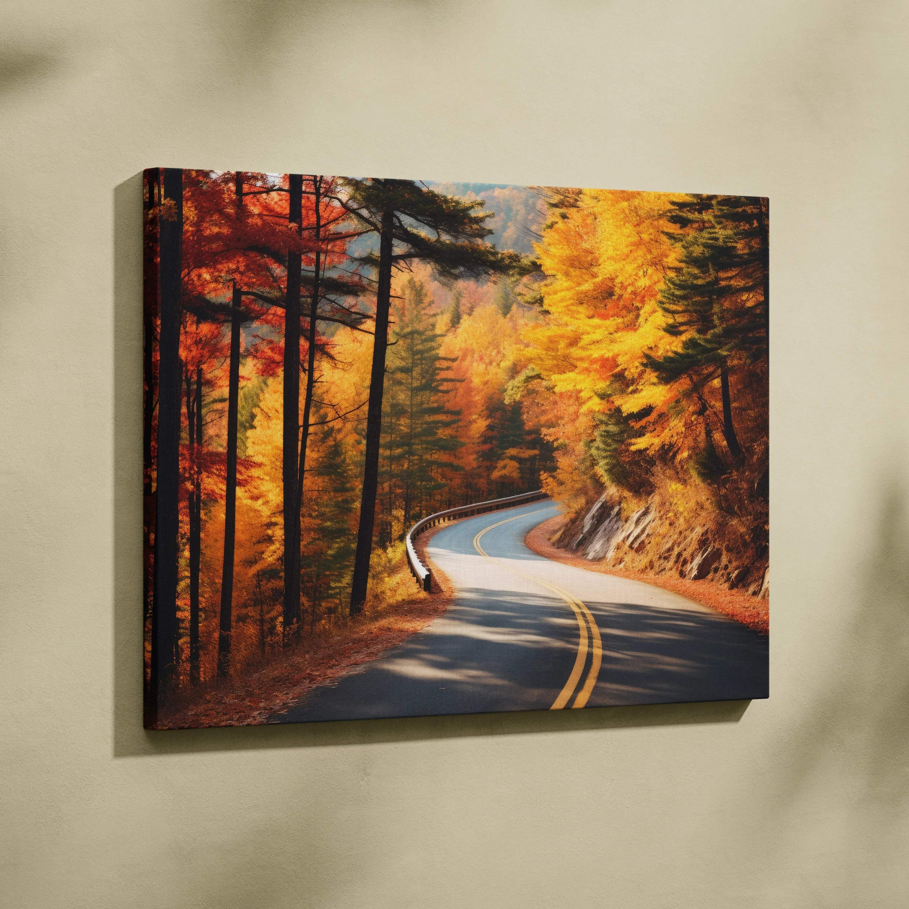 Autumn road winding through vibrant fall foliage with orange and yellow trees canvas wall art.