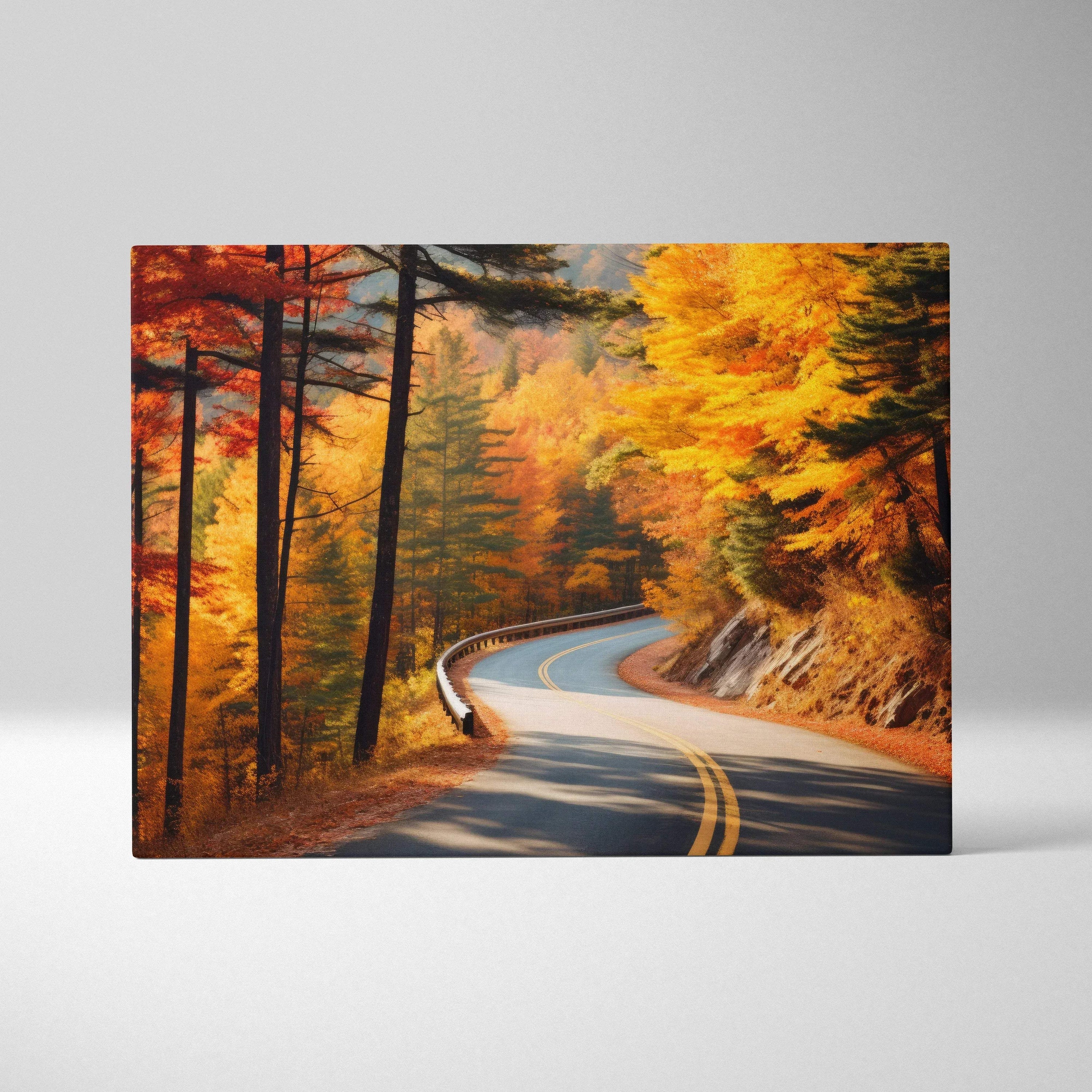 Vibrant autumn road winding through orange and yellow foliage canvas wall art.