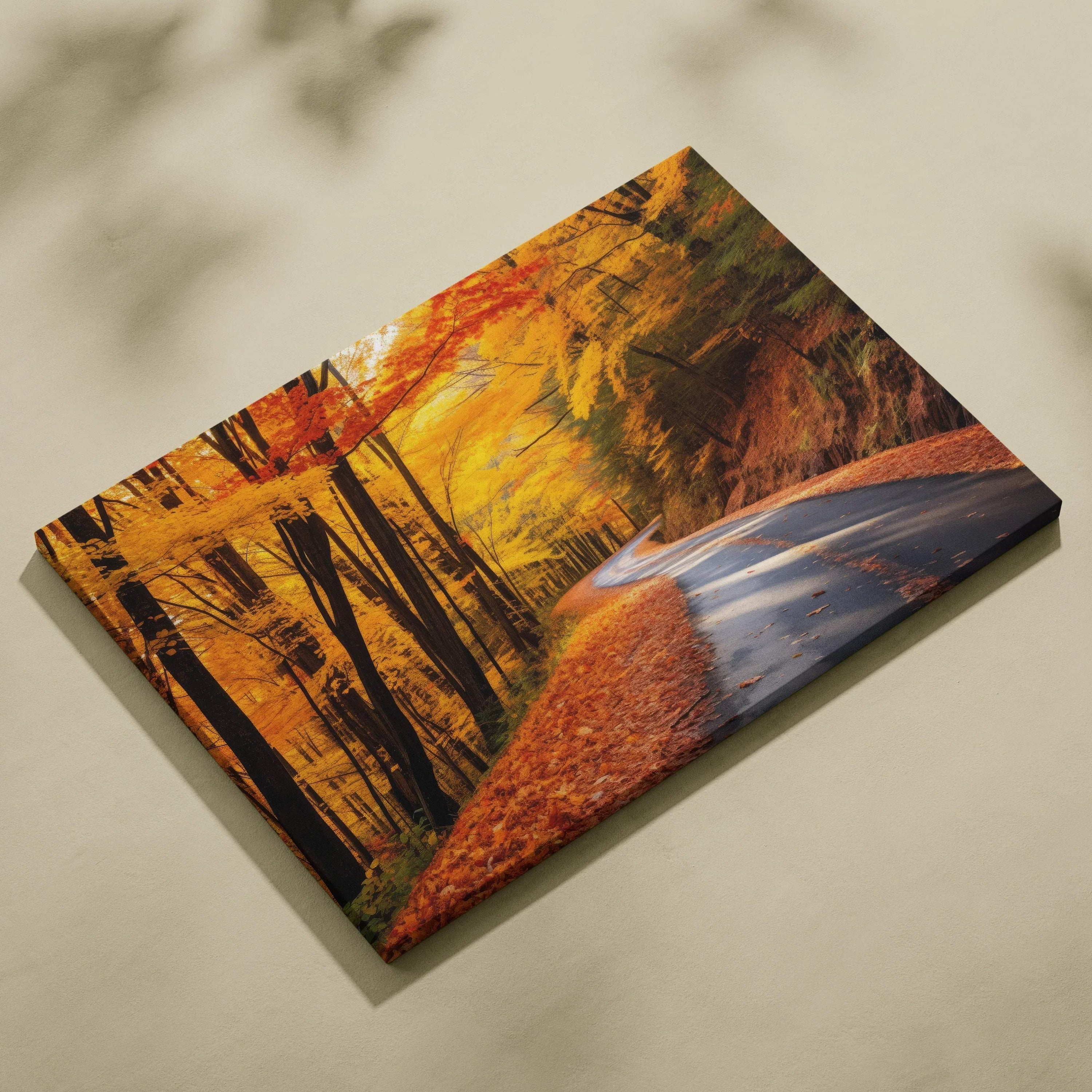 Autumn nature canvas art featuring vibrant fall foliage along a winding road, warm orange and yellow tones wall art.
