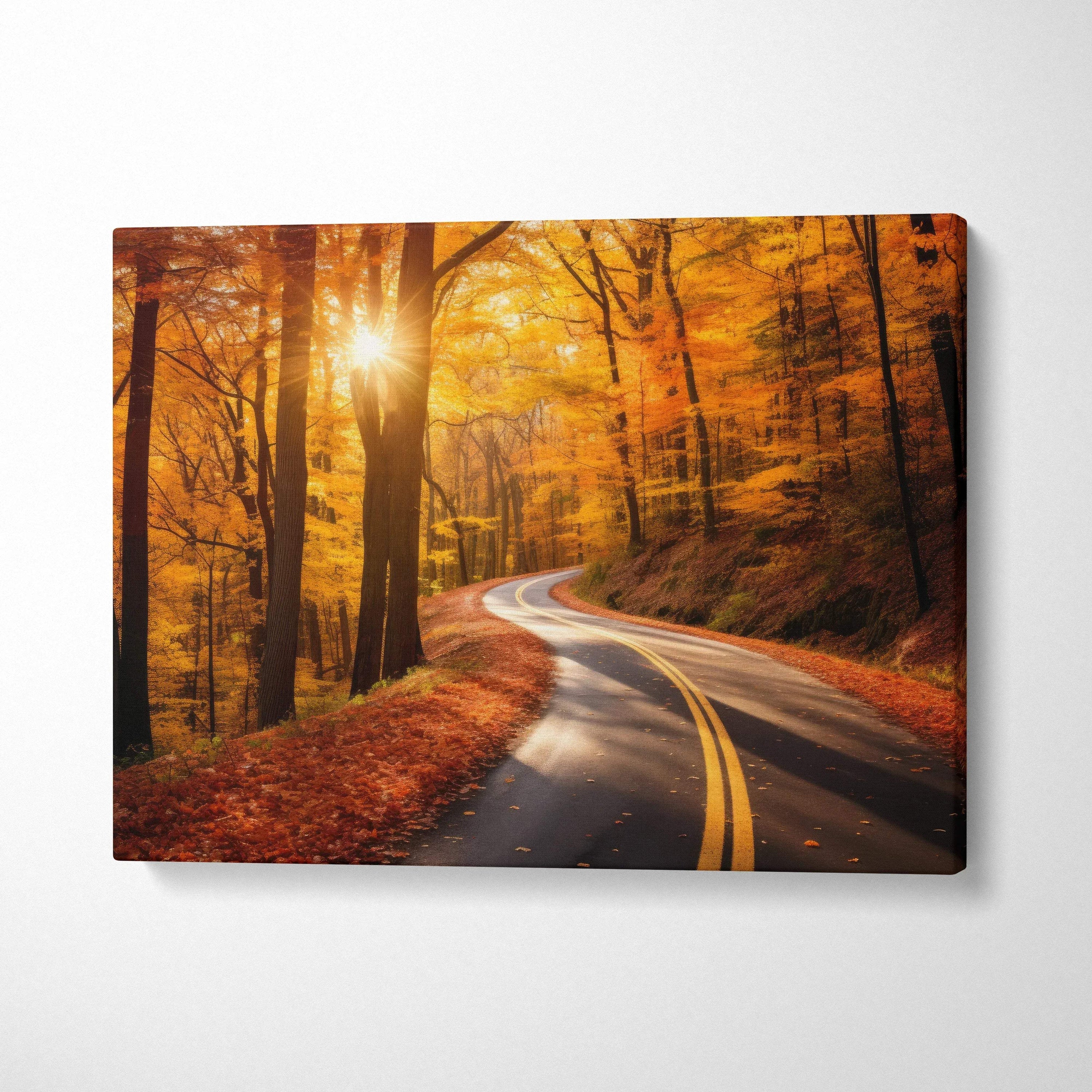 Autumn landscape canvas wall art featuring winding road at sunset with vibrant orange trees.