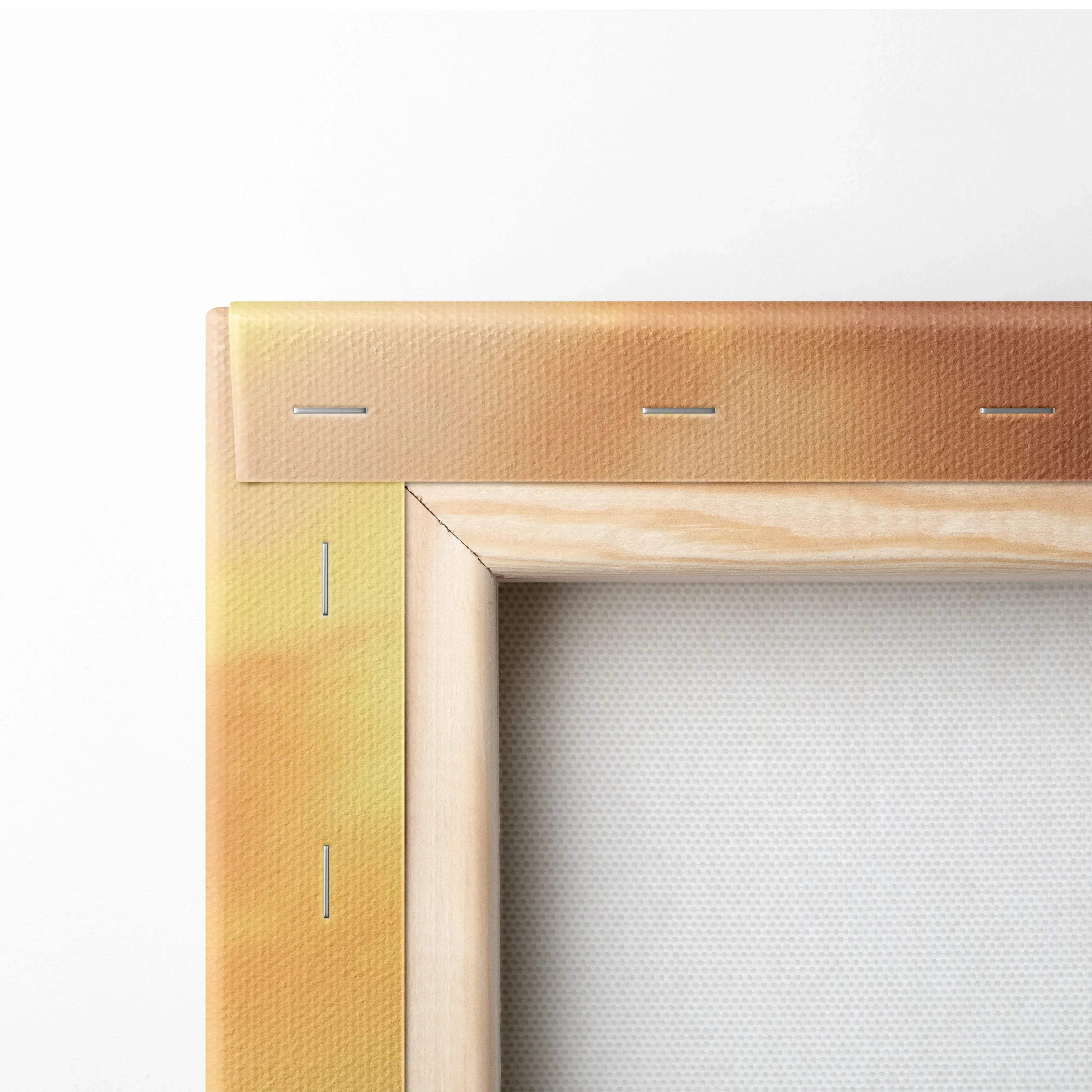 Corner close-up of wooden frame and stretched canvas with warm autumn sunset colors in wall art canvas print.