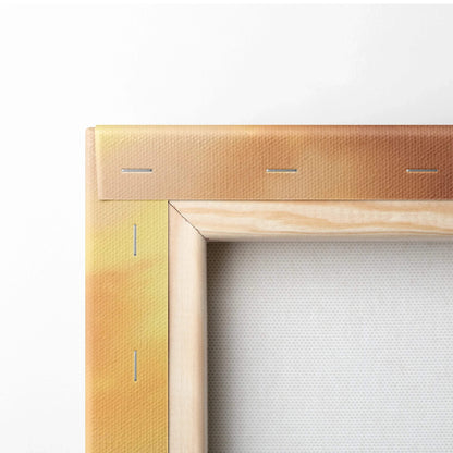 Corner close-up of wooden frame and stretched canvas with warm autumn sunset colors in wall art canvas print.