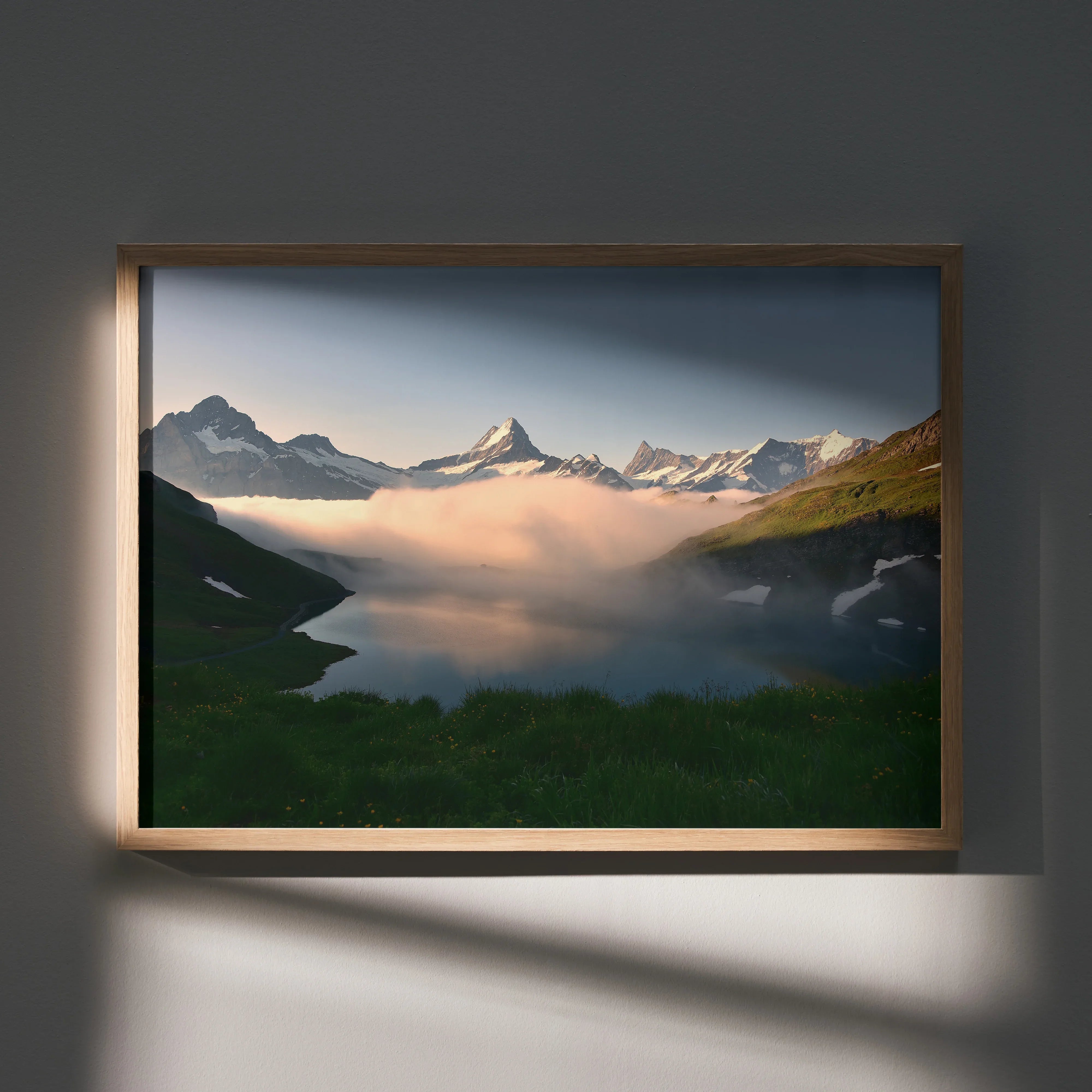 Majestic mountain landscape poster with fog over green valley, framed wall art with soft light.