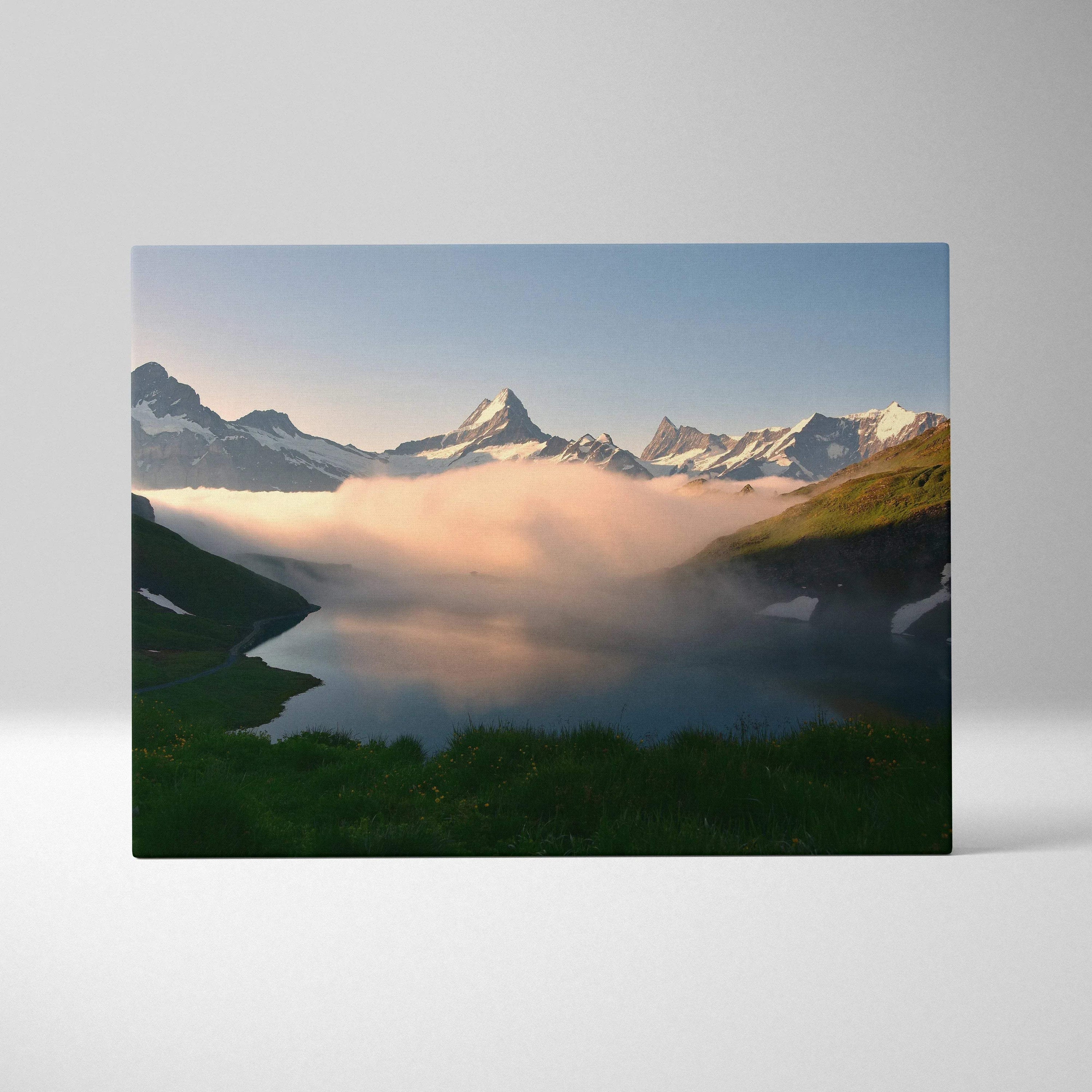 Canvas wall art featuring a majestic mountain landscape with morning fog and clear blue sky.