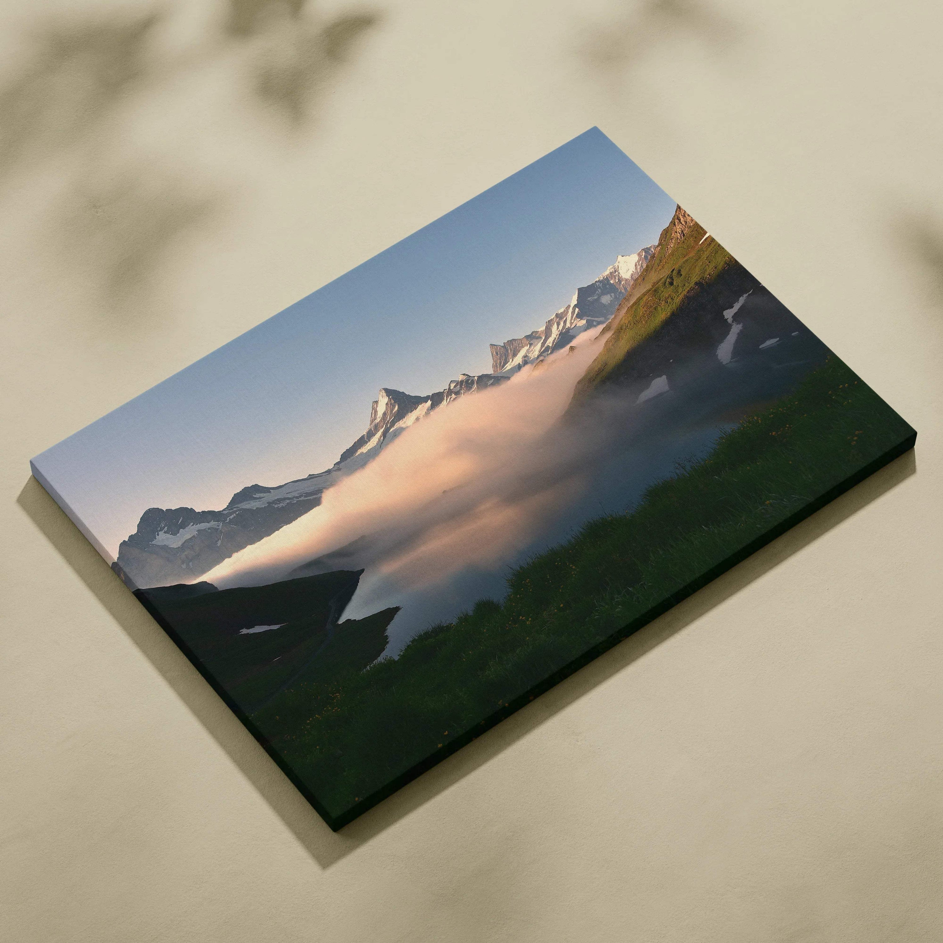Canvas wall art featuring majestic snow-capped mountain peaks above a misty valley under a clear blue sky.