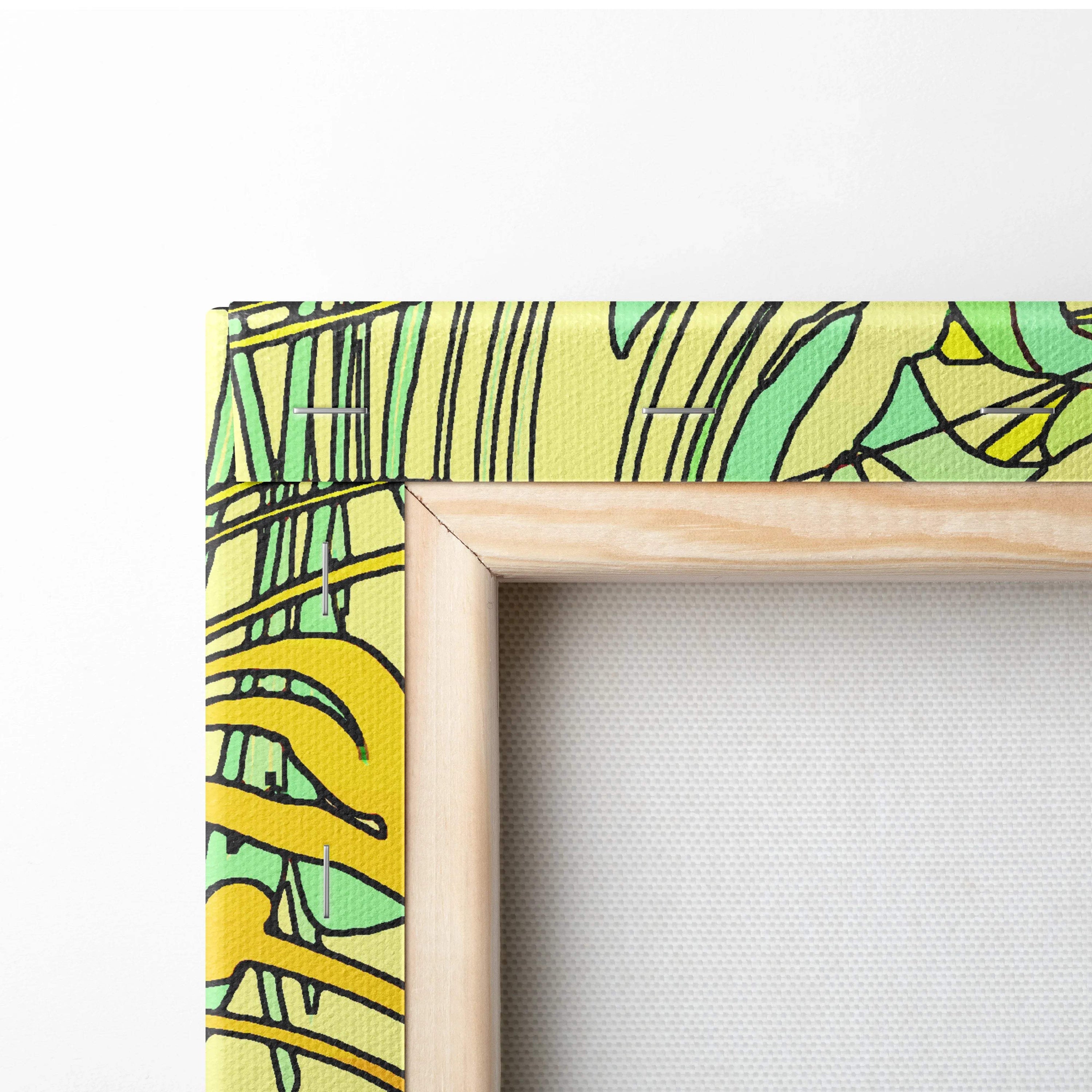 Vibrant yellow green tropical leaf canvas art in light wood frame