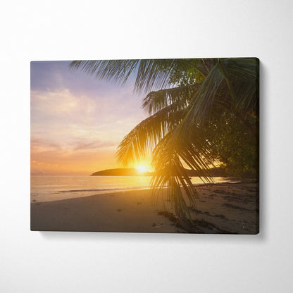 Tropical beach sunset canvas with palm trees in warm orange pink tones