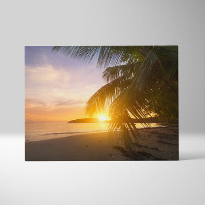 Tropical beach sunset canvas with palm trees in warm orange pink tones