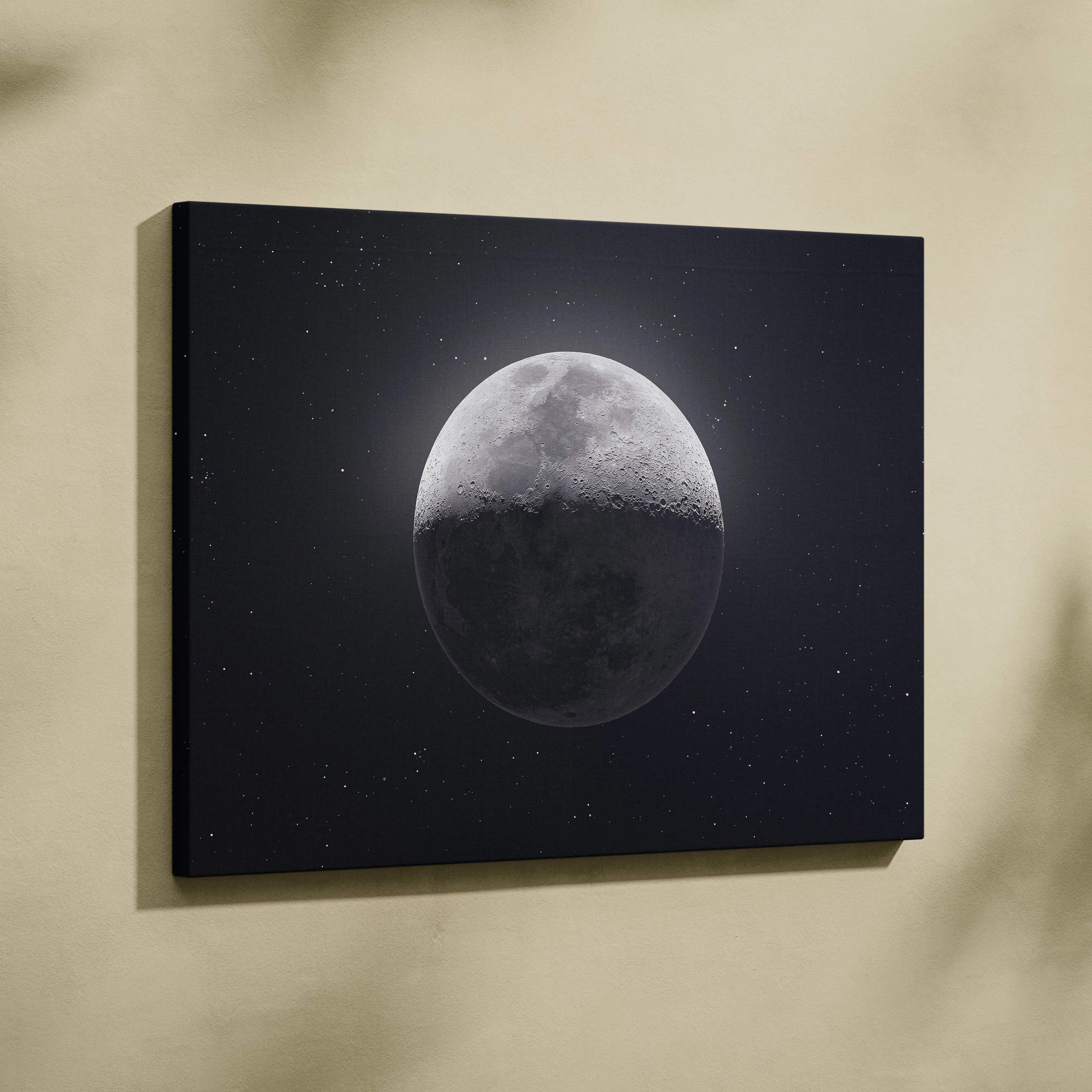 Black canvas print of half-lit moon in starry midnight blue space