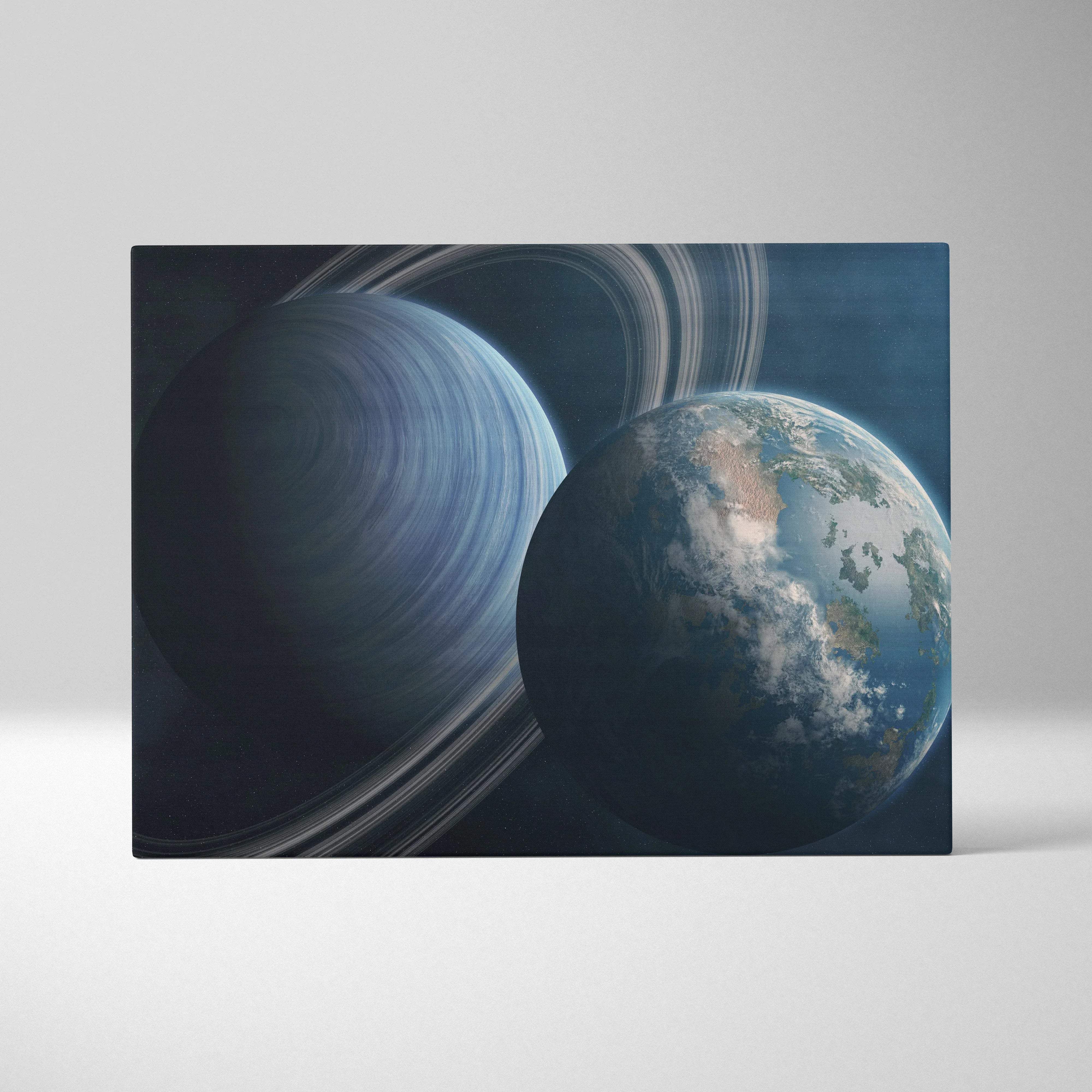 Ringed Saturn with Earth canvas wall art in deep blues and grays