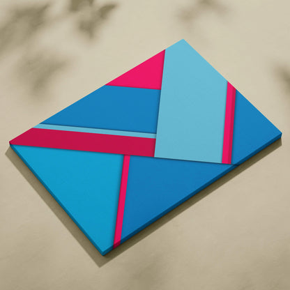 Geometric abstract canvas wall art with layered diagonal shapes in bold blue teal pink