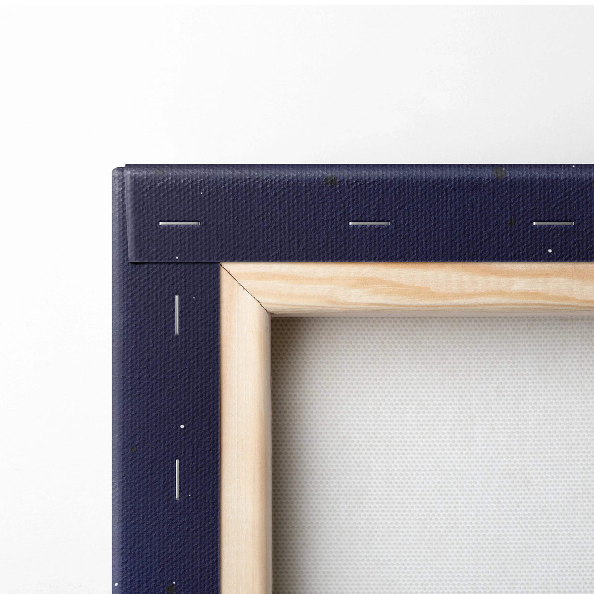 Minimalist astronaut silhouette on neon purple planet in navy blue canvas frame with light wood border
