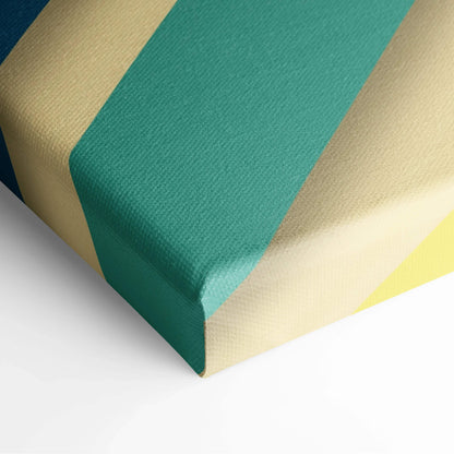 Gift wrapped in textured gold teal paper with diagonal stripes