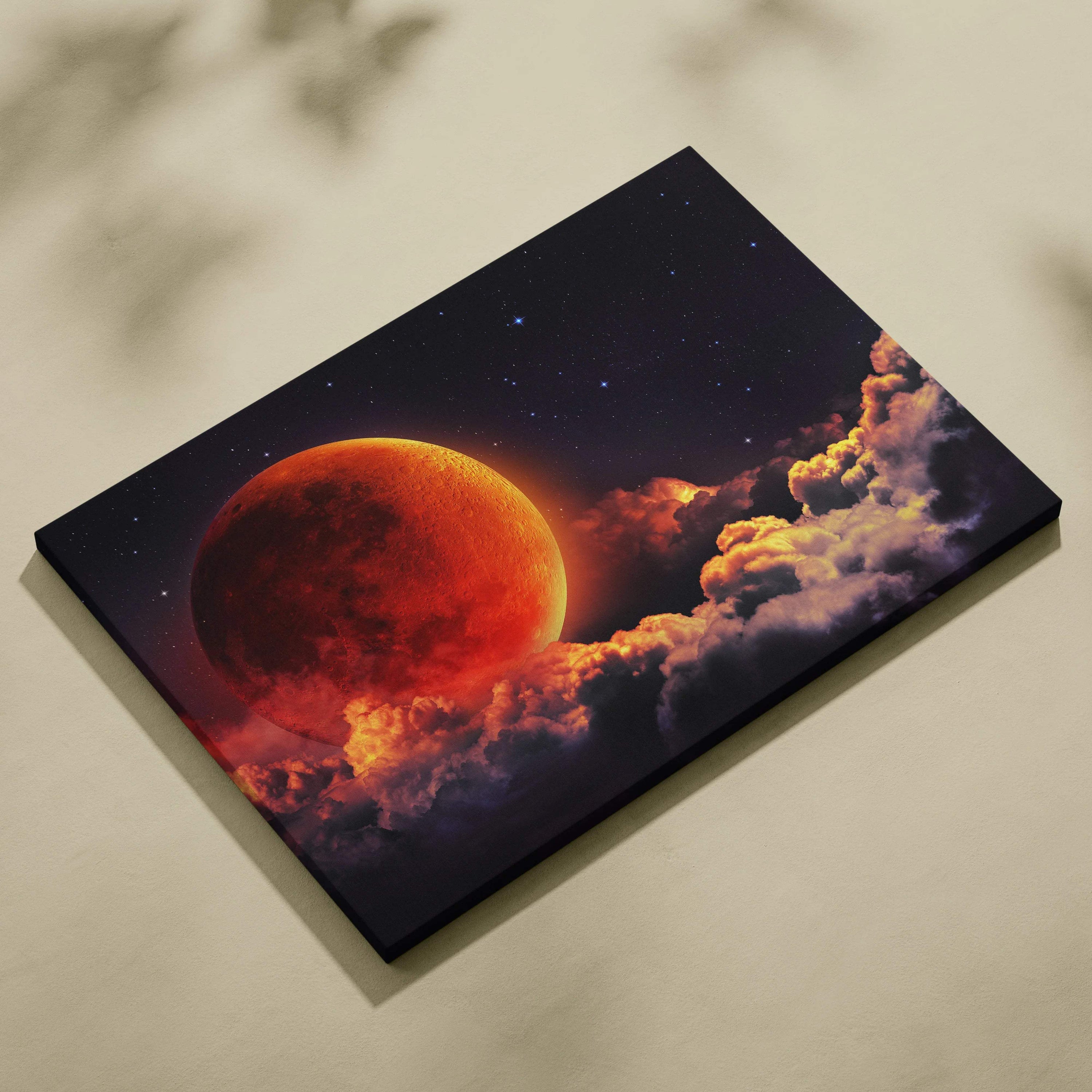 Massive red moon rising over glowing clouds in starry night sky canvas art