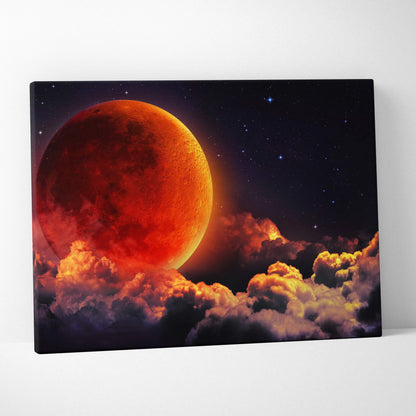 Massive red moon rising over glowing clouds in starry night sky canvas art