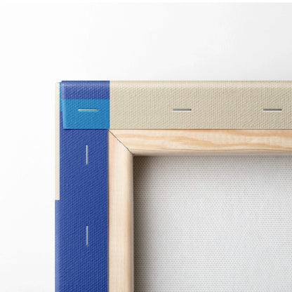 Back of beige canvas on light wood frame with blue tape, teal navy geometric art