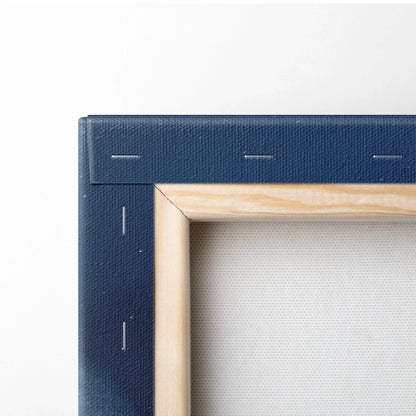 Navy blue canvas frame with light wood border on cinematic Earth moon art