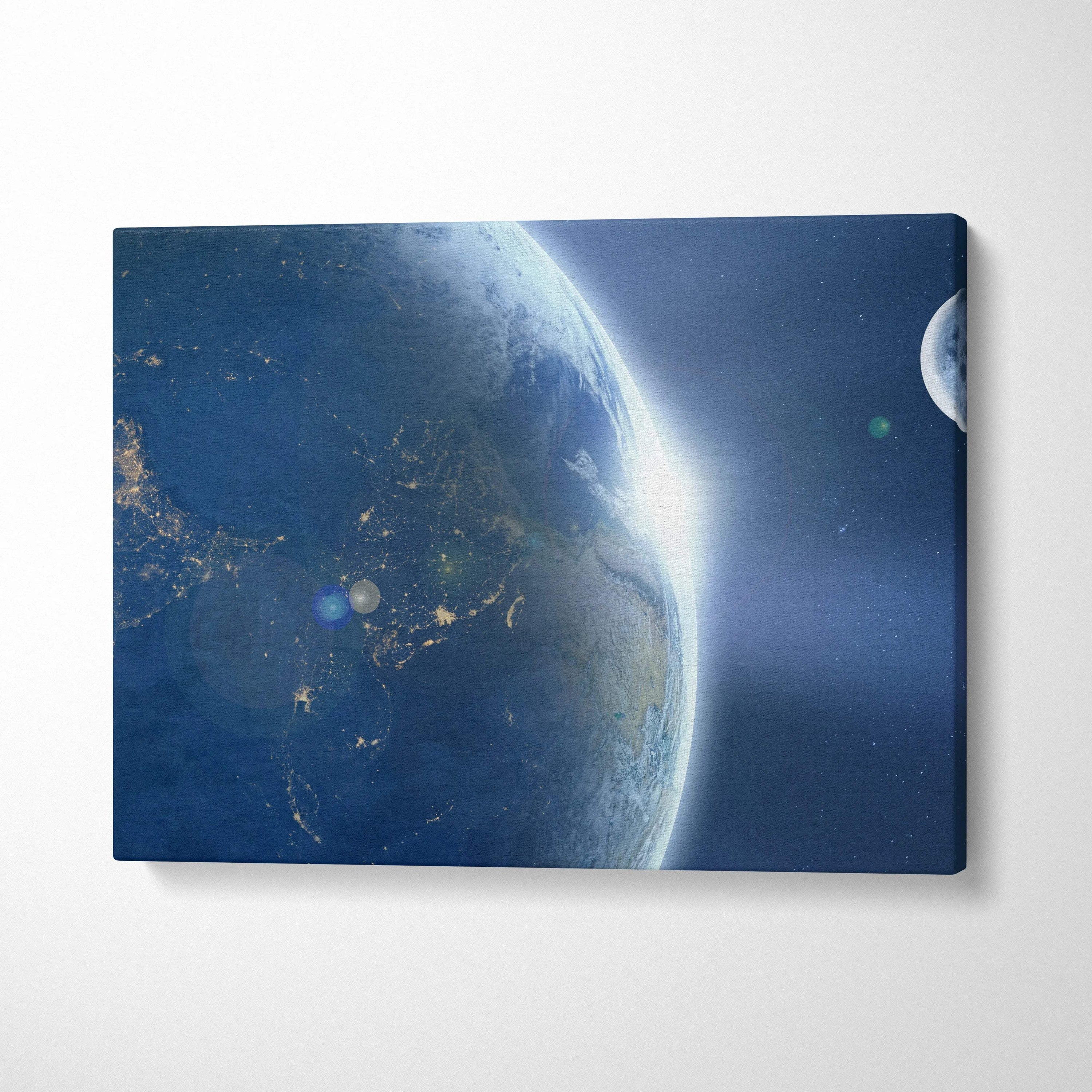 Cinematic Earth and Moon over glowing cities in midnight blue canvas print
