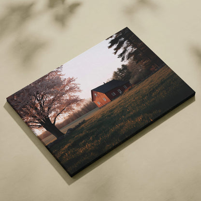 Cinematic red barn under cherry blossoms at dusk canvas wall art