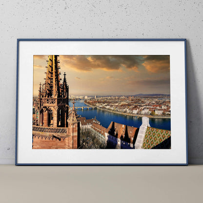 Sunset cityscape wall art poster featuring Gothic building spires overlooking a river and city skyline.