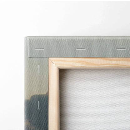 Close-up of wooden frame and stapled canvas backing for wall art.