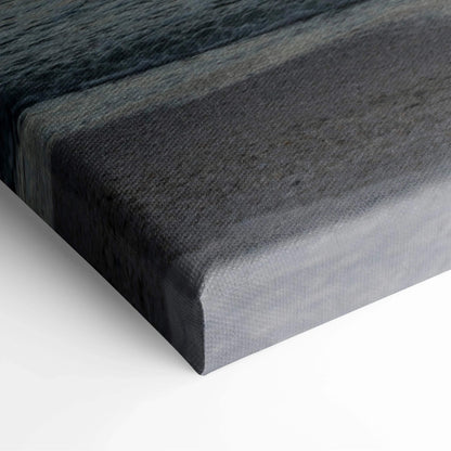 Close-up of vibrant sunset beach landscape canvas wall art with rich colors and textured edges.