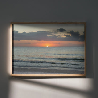 Beach sunset poster with calm ocean waves and soft clouds, wall art in wooden frame.