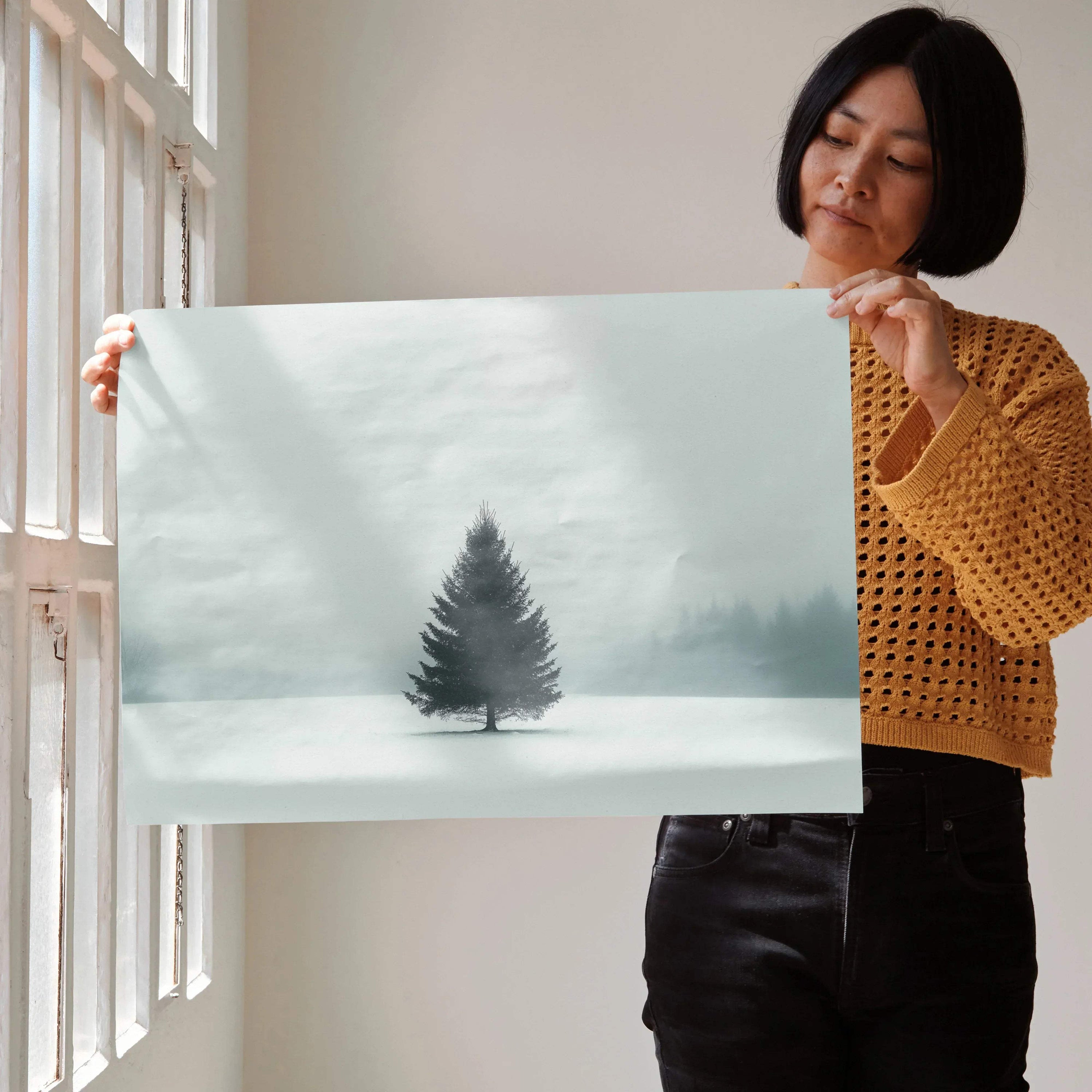 Snowy landscape poster featuring solitary pine tree in foggy winter scene, wall art print.