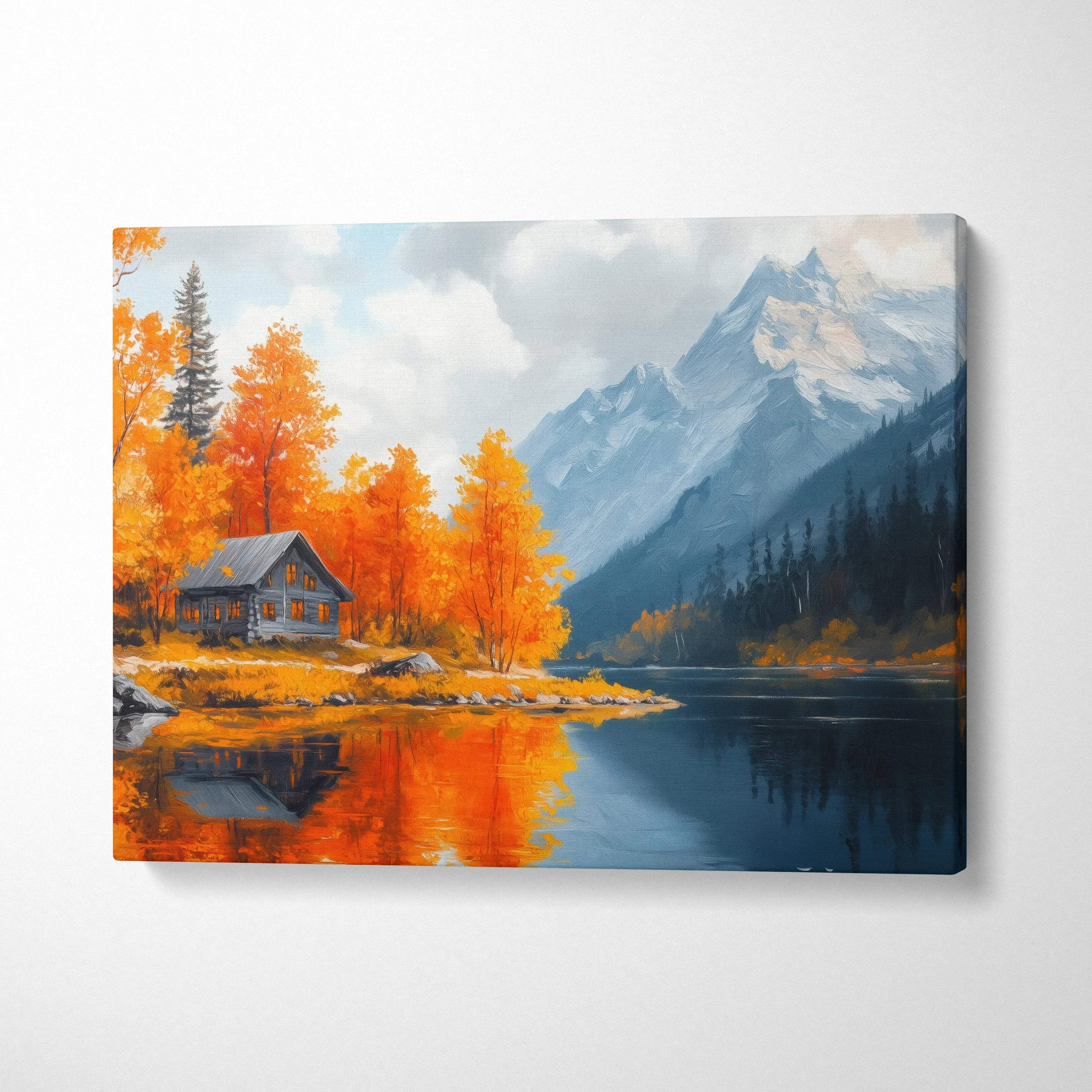 Canvas wall art of vibrant autumn trees and a red cabin by a reflective mountain lake under a cloudy sky.