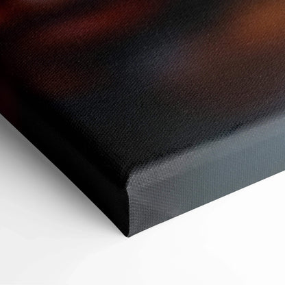 Close-up of black canvas wall art corner with textured surface and wrapped edges.