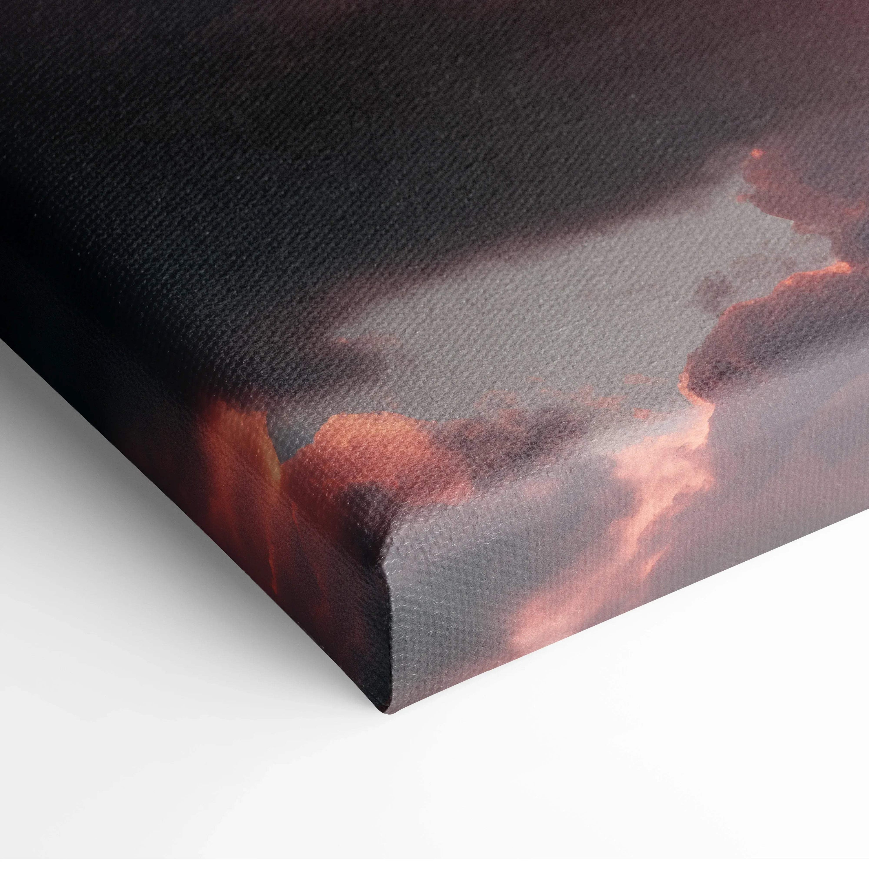 Canvas wall art featuring a vibrant sunset sky with dark clouds and glowing orange highlights.