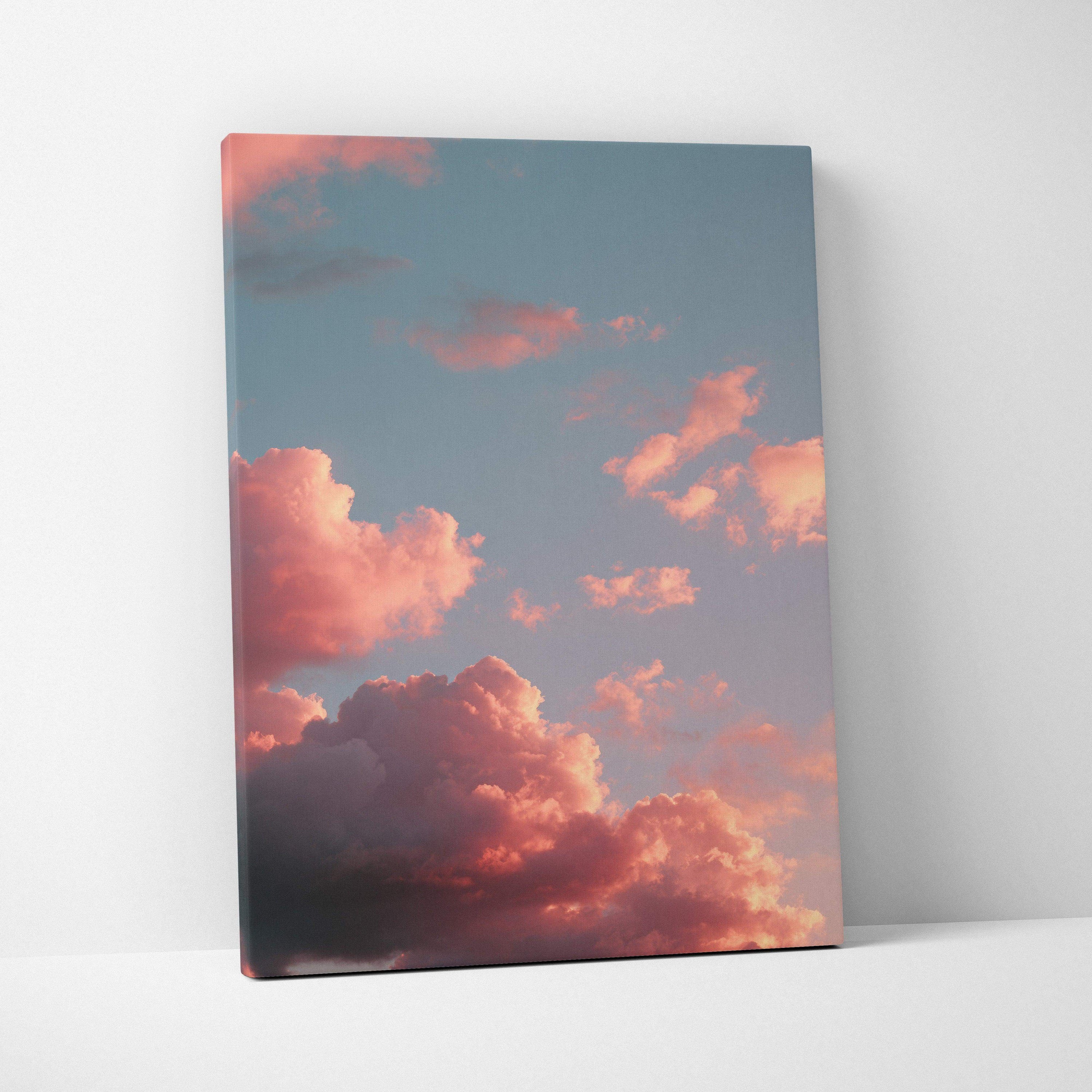 Canvas wall art featuring vibrant sunset clouds in a colorful sky with pink and orange hues.