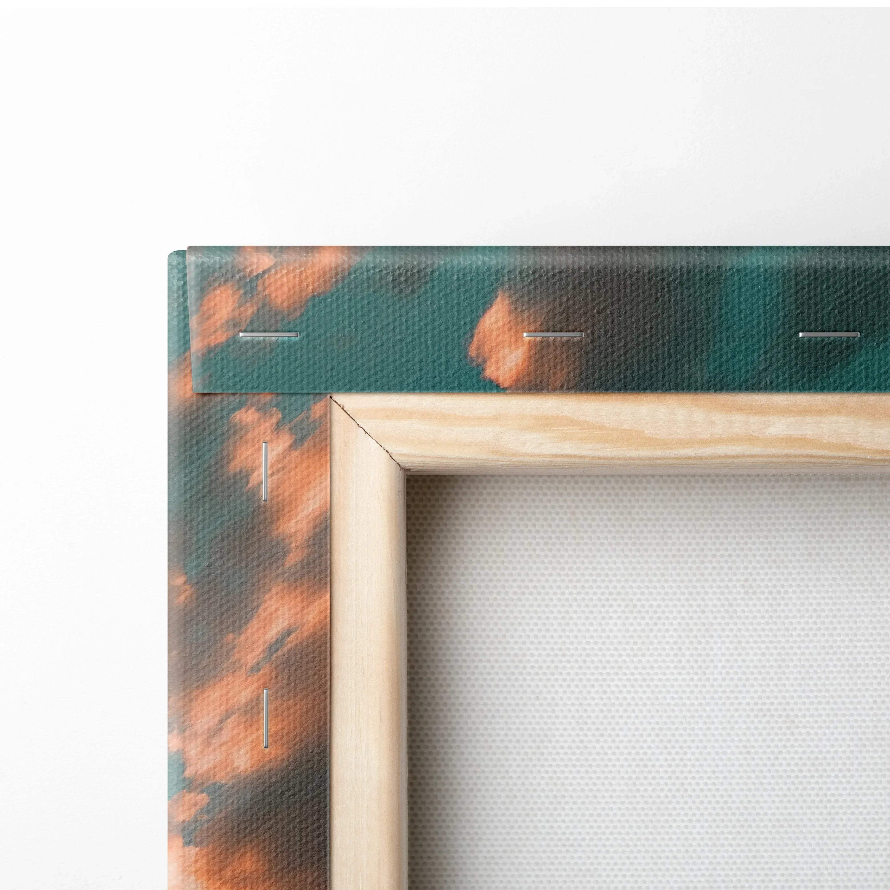 Close-up of canvas corner with wooden frame and abstract sunset mountain wall art texture.