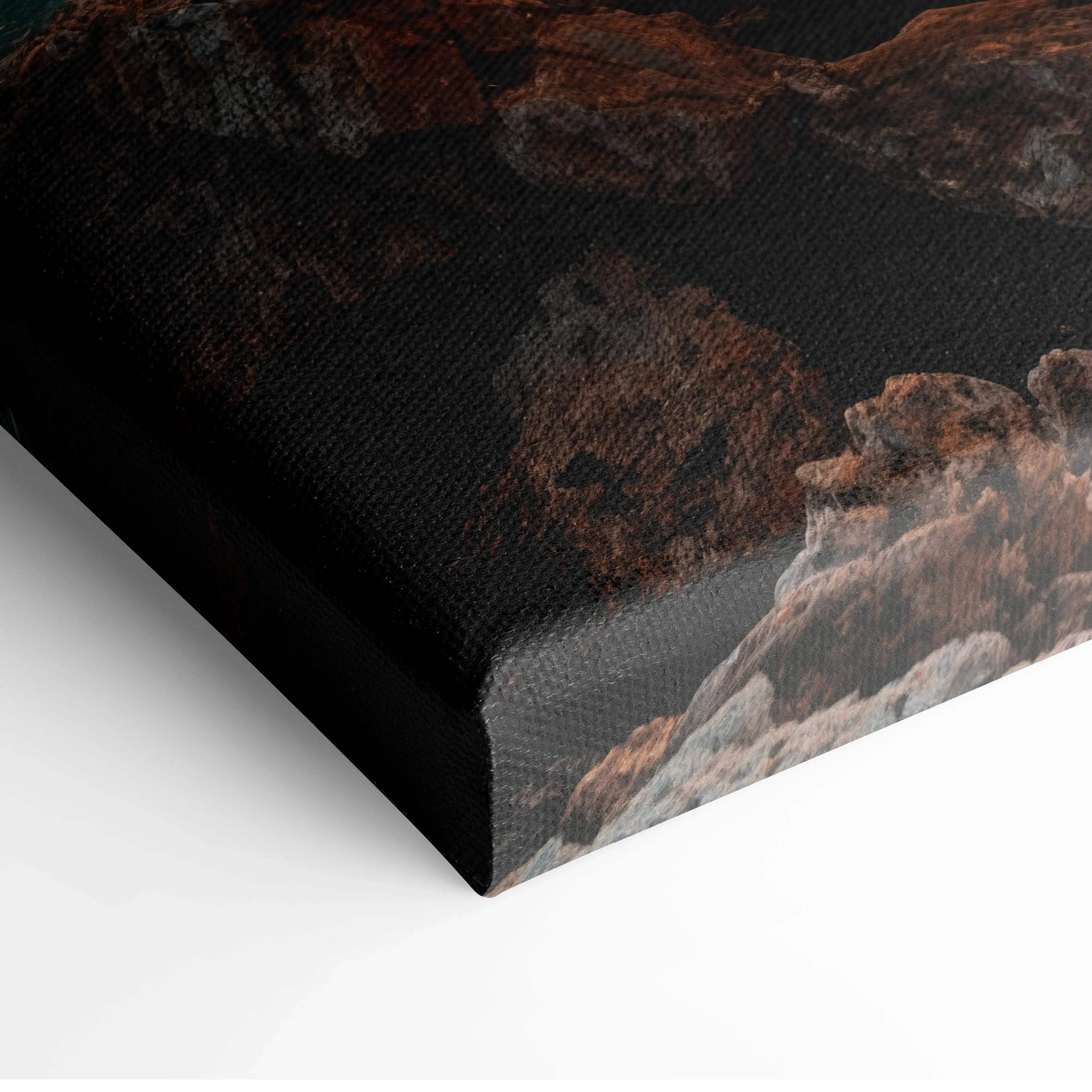 Close-up of canvas wall art corner with dark mountains and sunset tones.