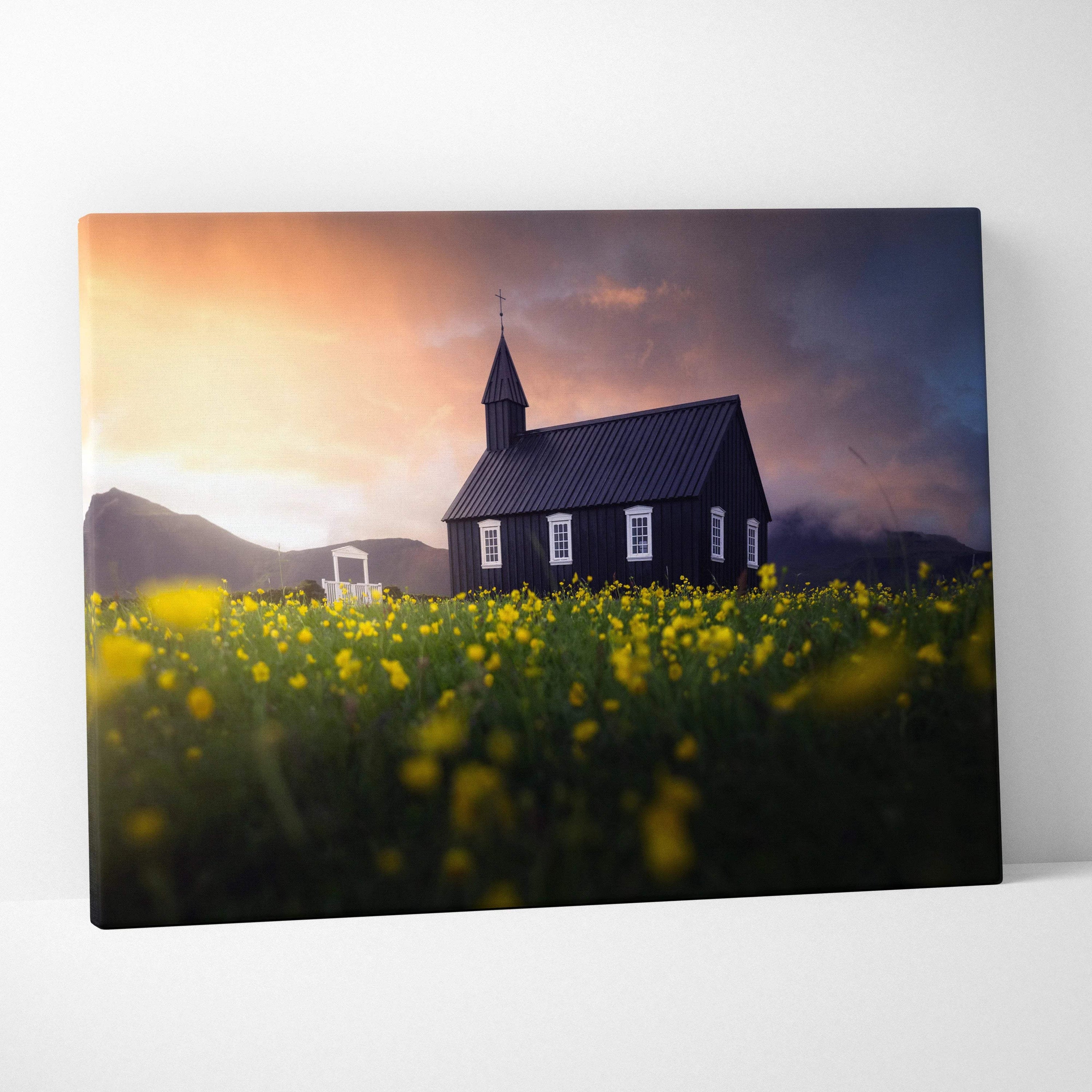 Black wooden church in yellow wildflowers at sunset moody blues canvas art