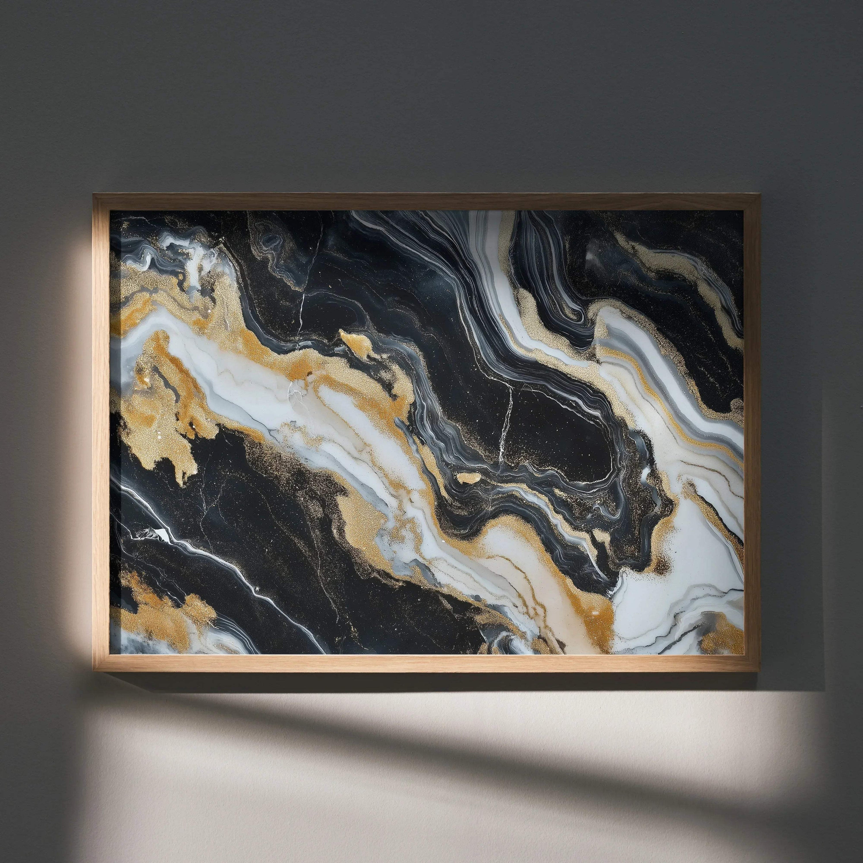Abstract art wall poster with black, white, and gold swirling marble patterns in a wooden frame.